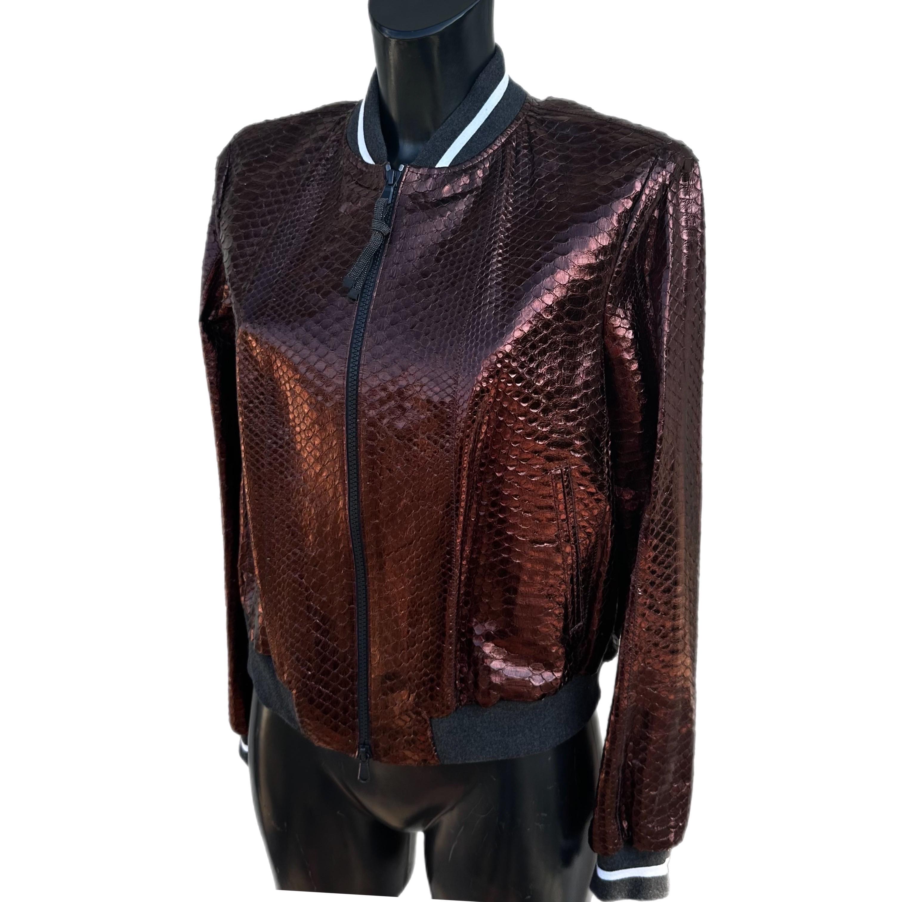 Brunello Cucinelli bronze-colored python bomber jacket. 
Side zip closure 
size 44 New with tag, hanger and hanger included Measurements: 
Shoulders 41cm 
Chest 42cm 
Width 52cm 
Length 56cm