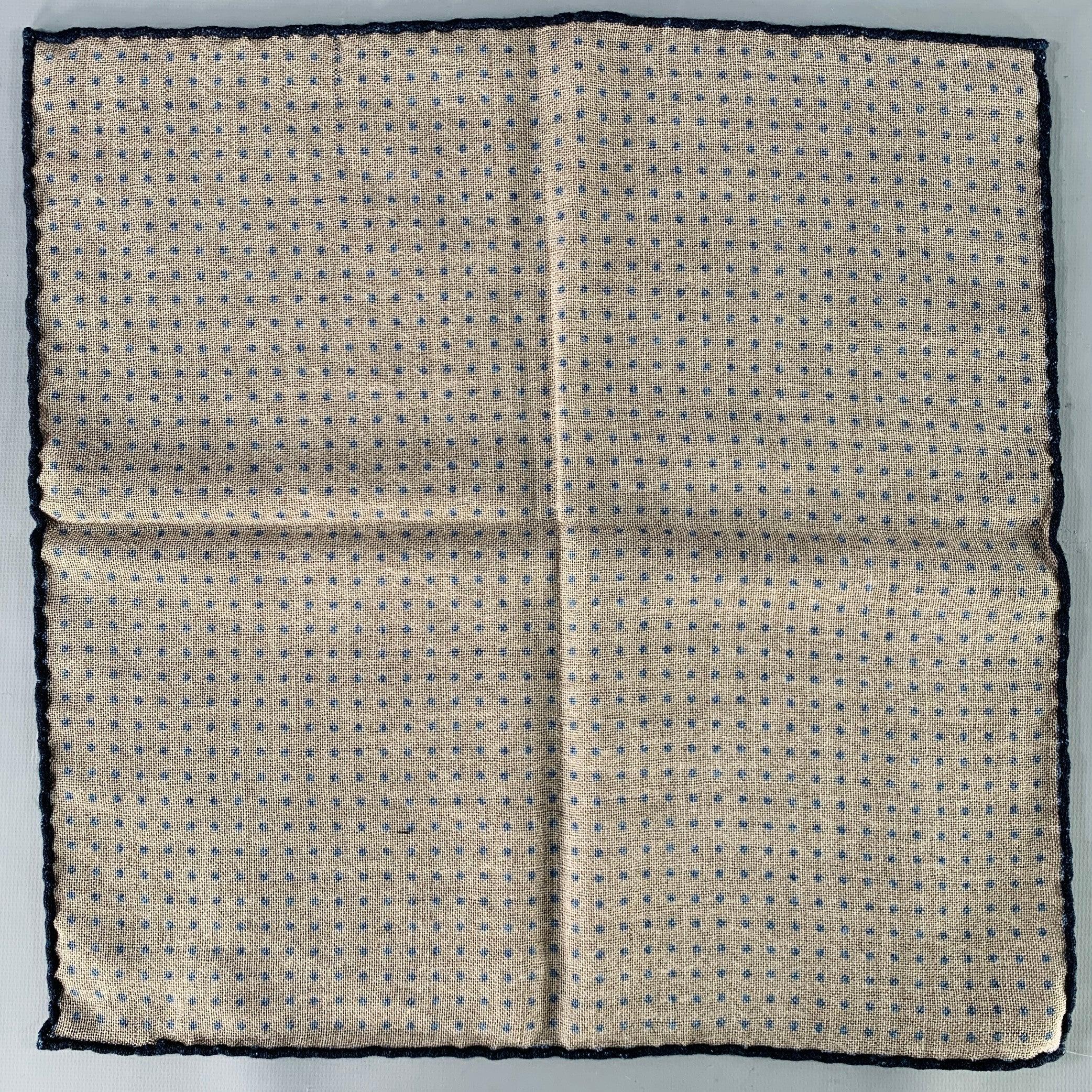 BRUNELLO CUCINELLI pocket square in a brown and navy woven fabric featuring a polka dot pattern and hand rolled edges.Very Good Pre-Owned Condition. Minor signs of wear. Brand tag removed by previous owner. 

Measurements: 
  15 inches  x 14.5