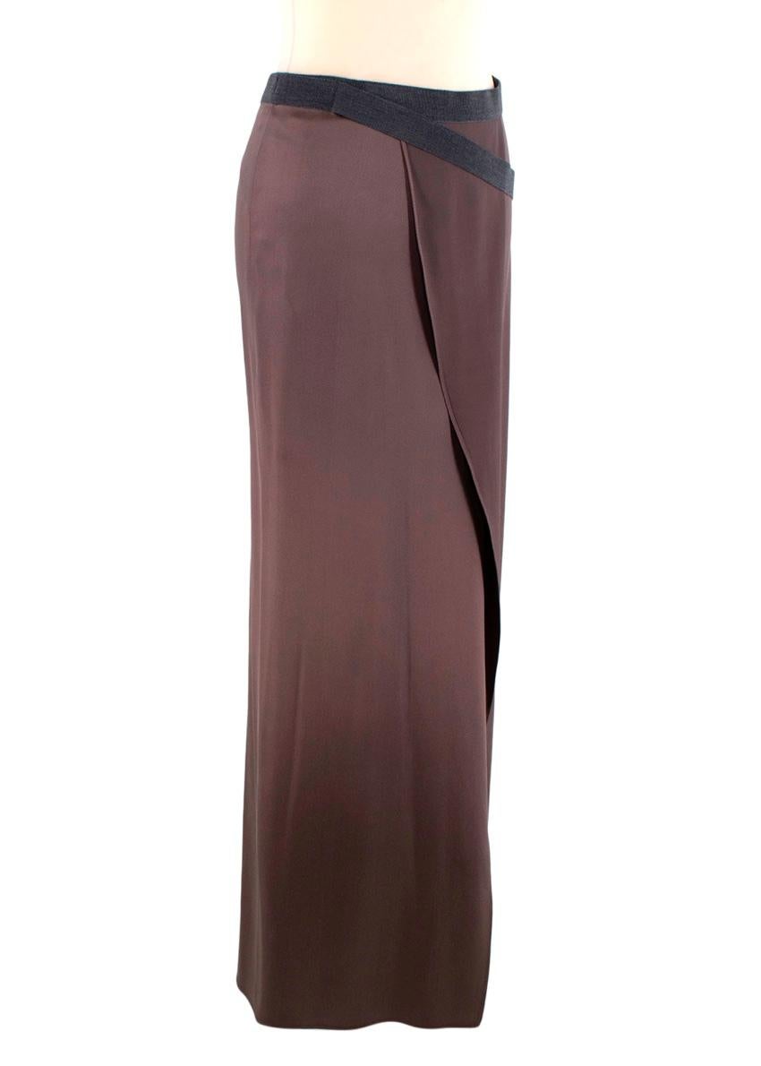 Brunello Cucinelli Brown Silk Maxi Skirt With Asymmetric Waistband 

-Elegant brown silk maxi skirt 
-Grey asymmetric elastic 
waistband 
-Front subtle slit 

Materials 
92% Silk 
8% Elastane 
Applique 
90% Wool 
6% Nylon
4% Elastane 

Made in Italy