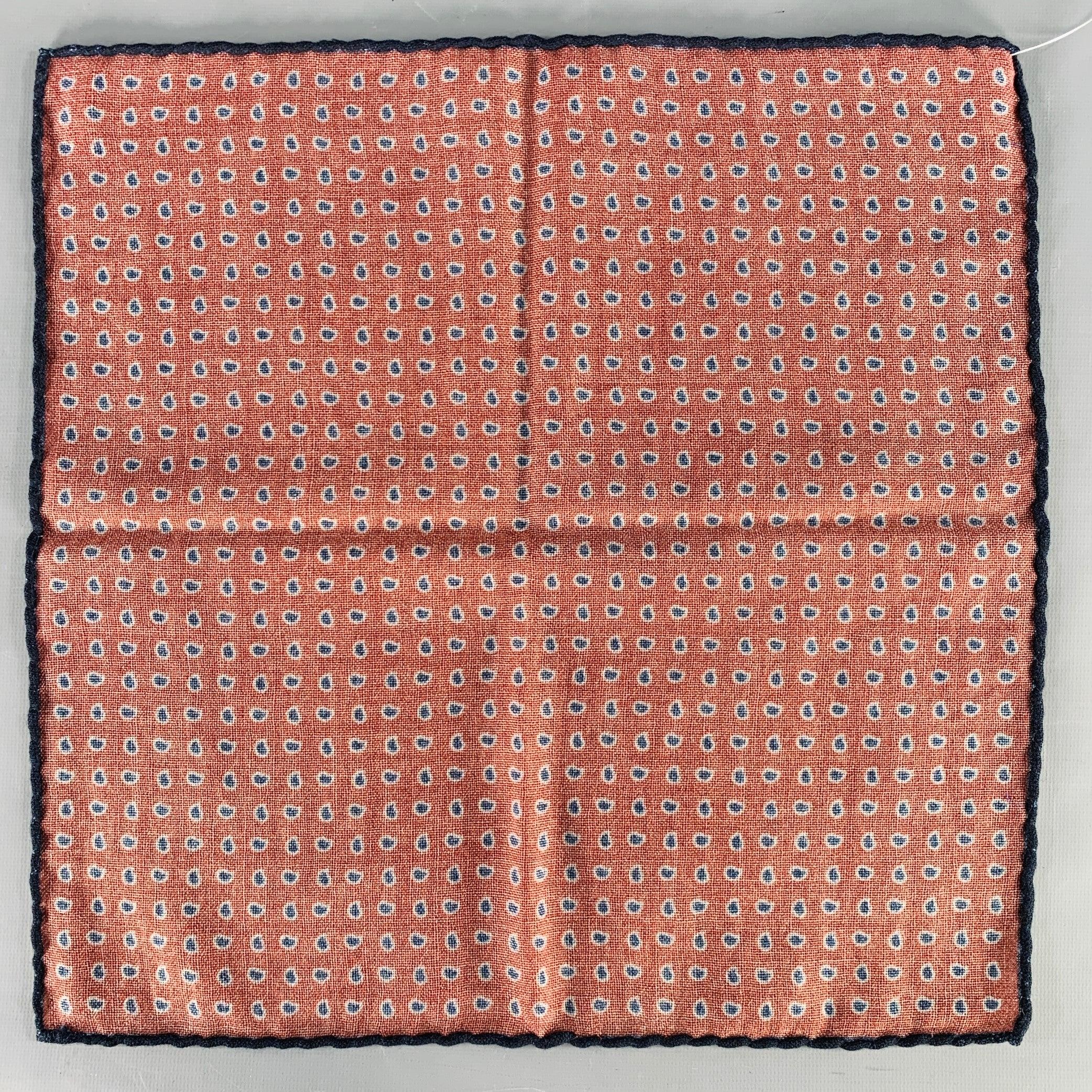 BRUNELLO CUCINELLI pocket square
in a burgundy and navy woven fabric featuring a paisley pattern and hand rolled edges.Very Good Pre-Owned Condition. Brand tag removed by previous owner. 

Measurements: 
  15 inches  x 14.5 inches  
  
  
 
Sui