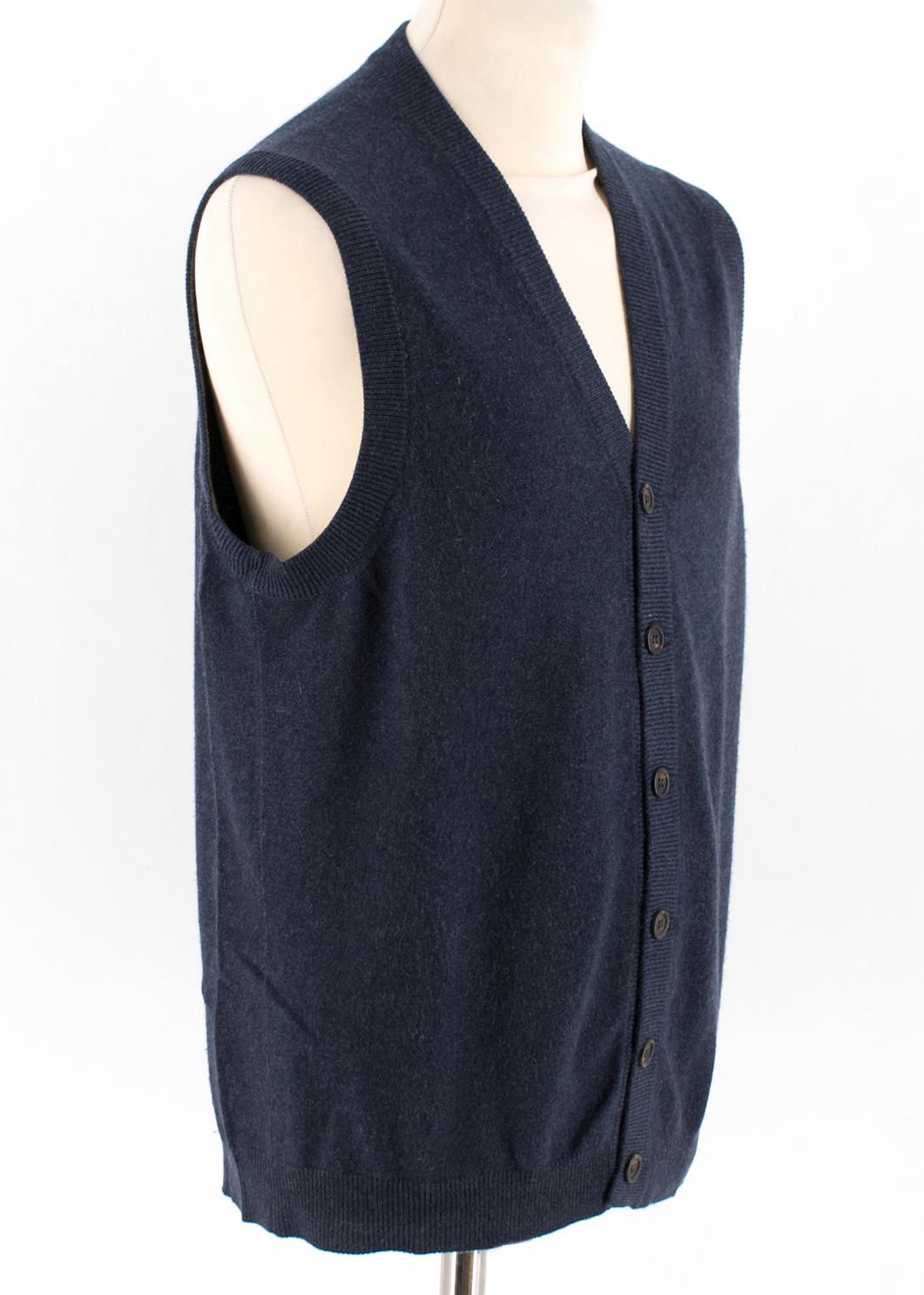 Brunello Cucinelli Cashmere Blue Sleeveless Cardigan

- Made in Italy
- Features a single breasted button fastening 
- V-neck
- 100% Cashmere

Please note, these items are pre-owned and may show some signs of storage, even when unworn and unused.