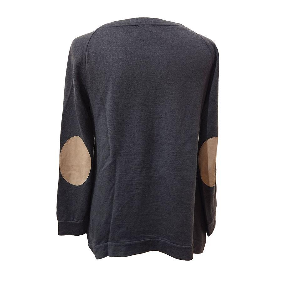 Cashmere (81%), cotton (15%) and silk Grey color Round neck Leather patches Shoulder/hem cm 58 (22,8 inches)