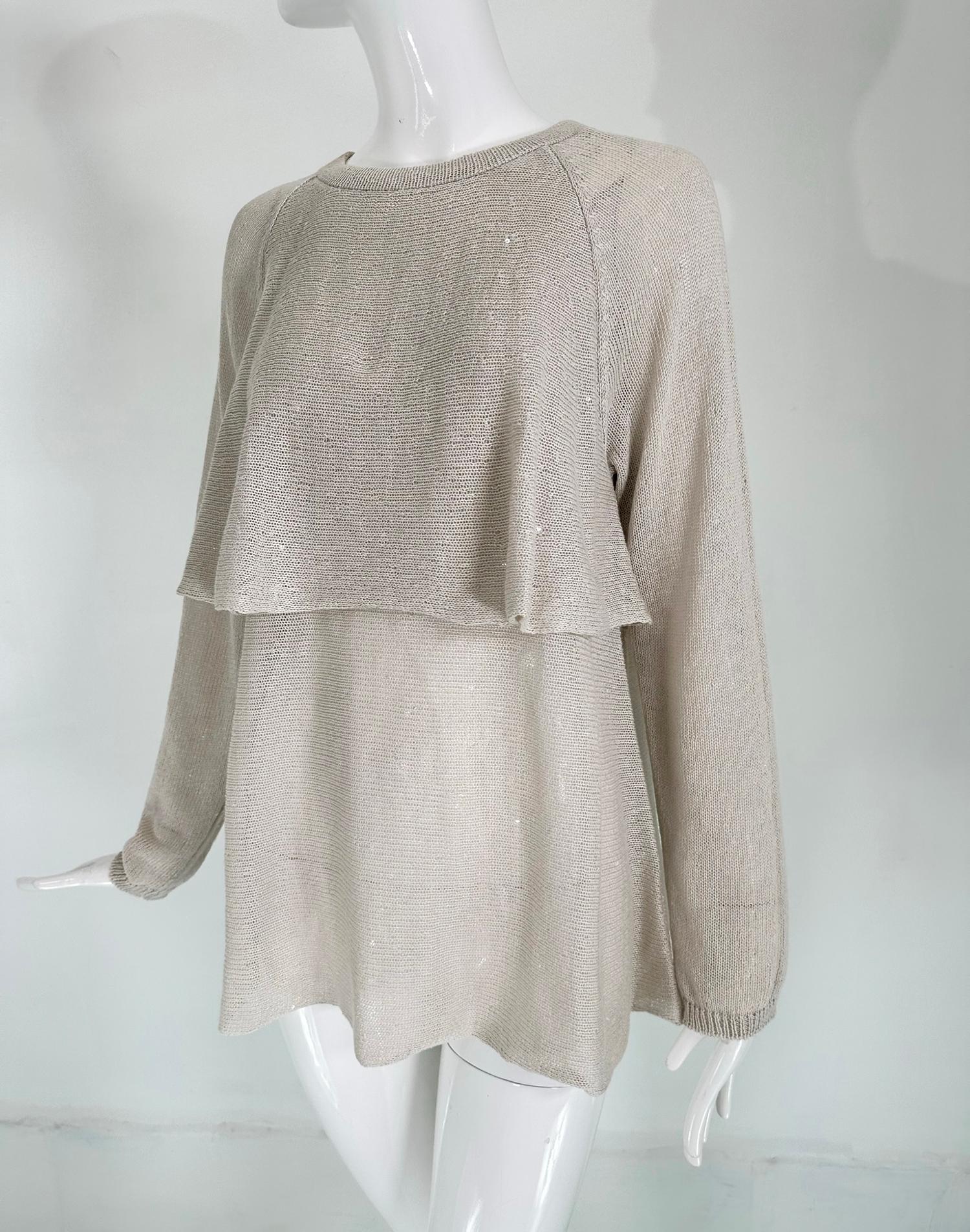 Brunello Cucinelli natural ecru linen & silk, sequin sewn, pullover, layered tunic knit  sweater. Long raglan sleeves, mid torso layered drape front & back. Unworn with tags, irregularities as with all hand knits.
Beautiful sweater perfect to layer