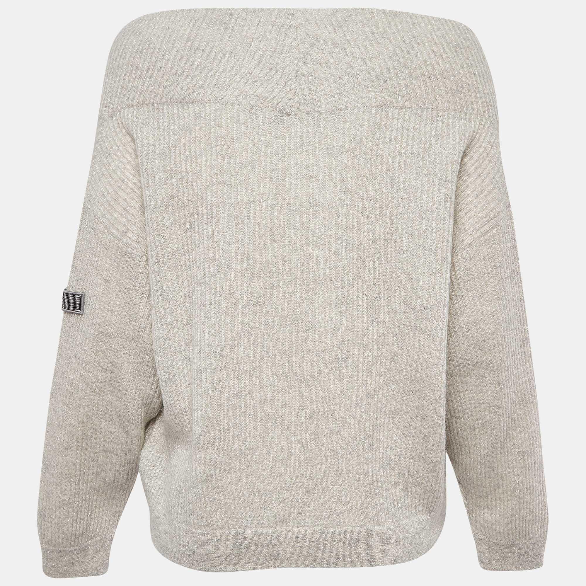 How fabulous does this designer sweater look! It is made of fine materials and features long sleeves. Pair it with pants and sneakers for a cool look.

