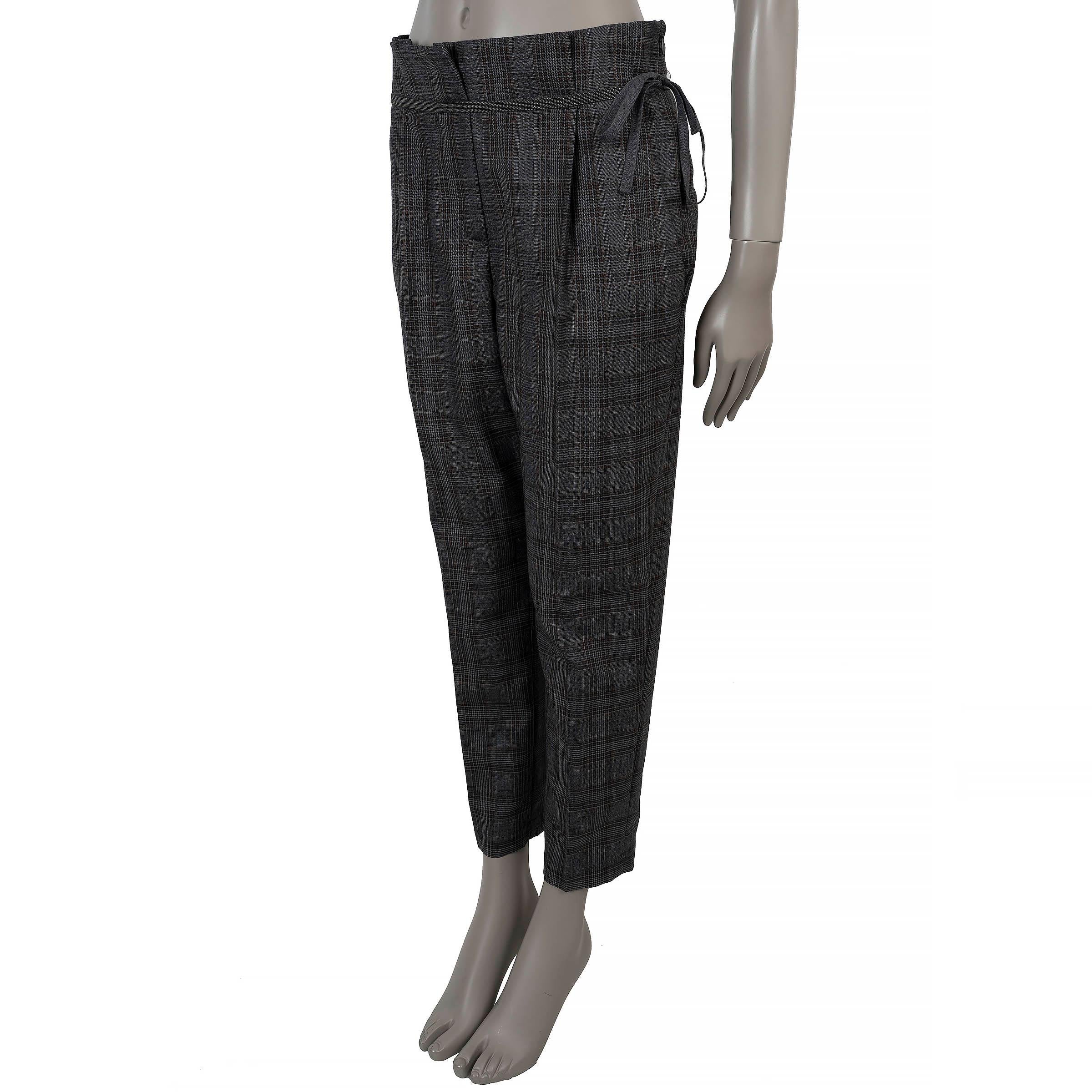 This 100% authentic Brunello Cucinelli pant is tailored in grey and brown plaid wool (100%), combining timeless tailoring with casual refinement. It features a paperbag waist accented by a signature Monili-embellished ribbon belt, adding a discreet
