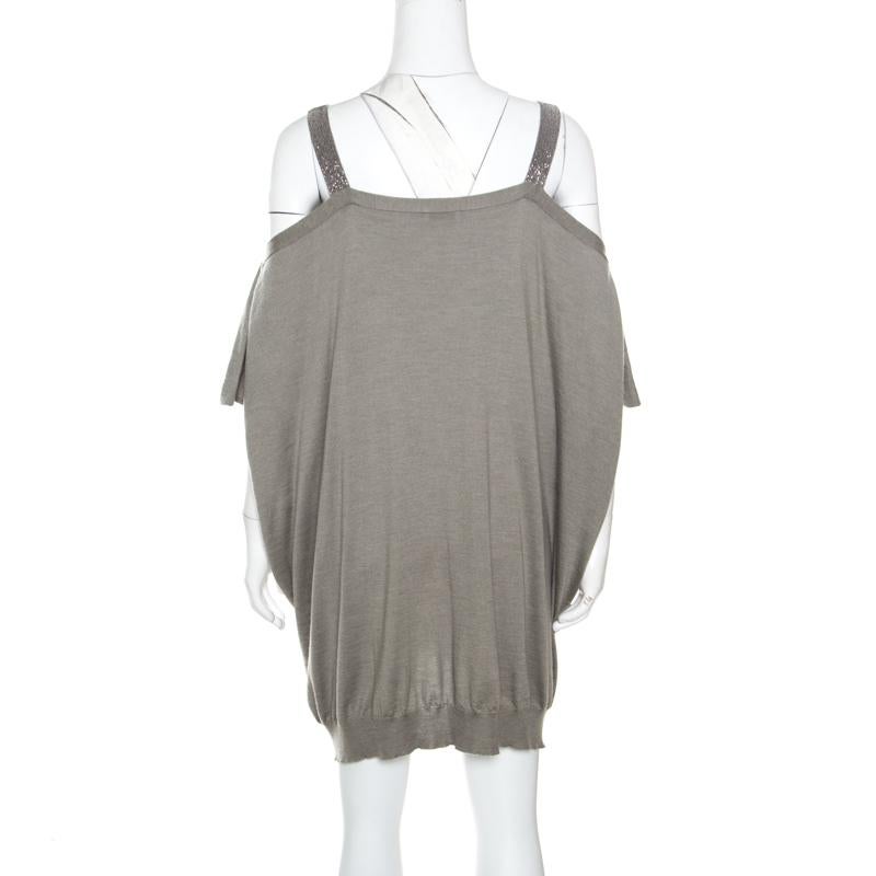 Simple and sophisticated is what defines this cold shoulder dress from Brunello Cucinelli. The grey dress is made of a cashmere and silk blend and features a rectangular neckline, monili trim shoulder strap detailing and a relaxed silhouette. Sure