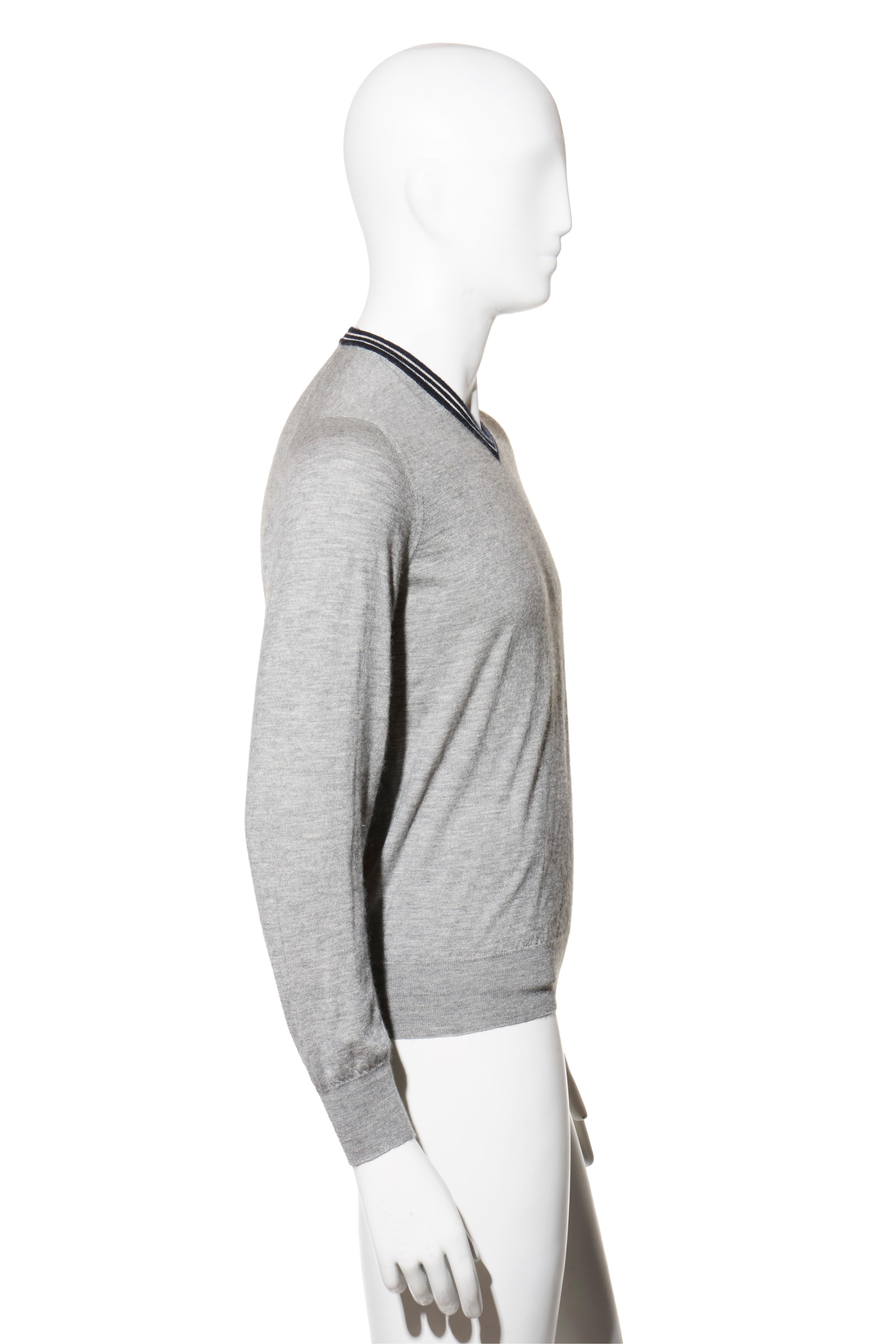 Brunello Cucinelli Grey Cashmere-Silk V-Neck Sweater, Made in Italy

Description:
This sophisticated Brunello Cucinelli men’s V-neck sweater reflects the brand’s signature blend of luxury, craftsmanship, and effortless refinement.
Expertly woven in