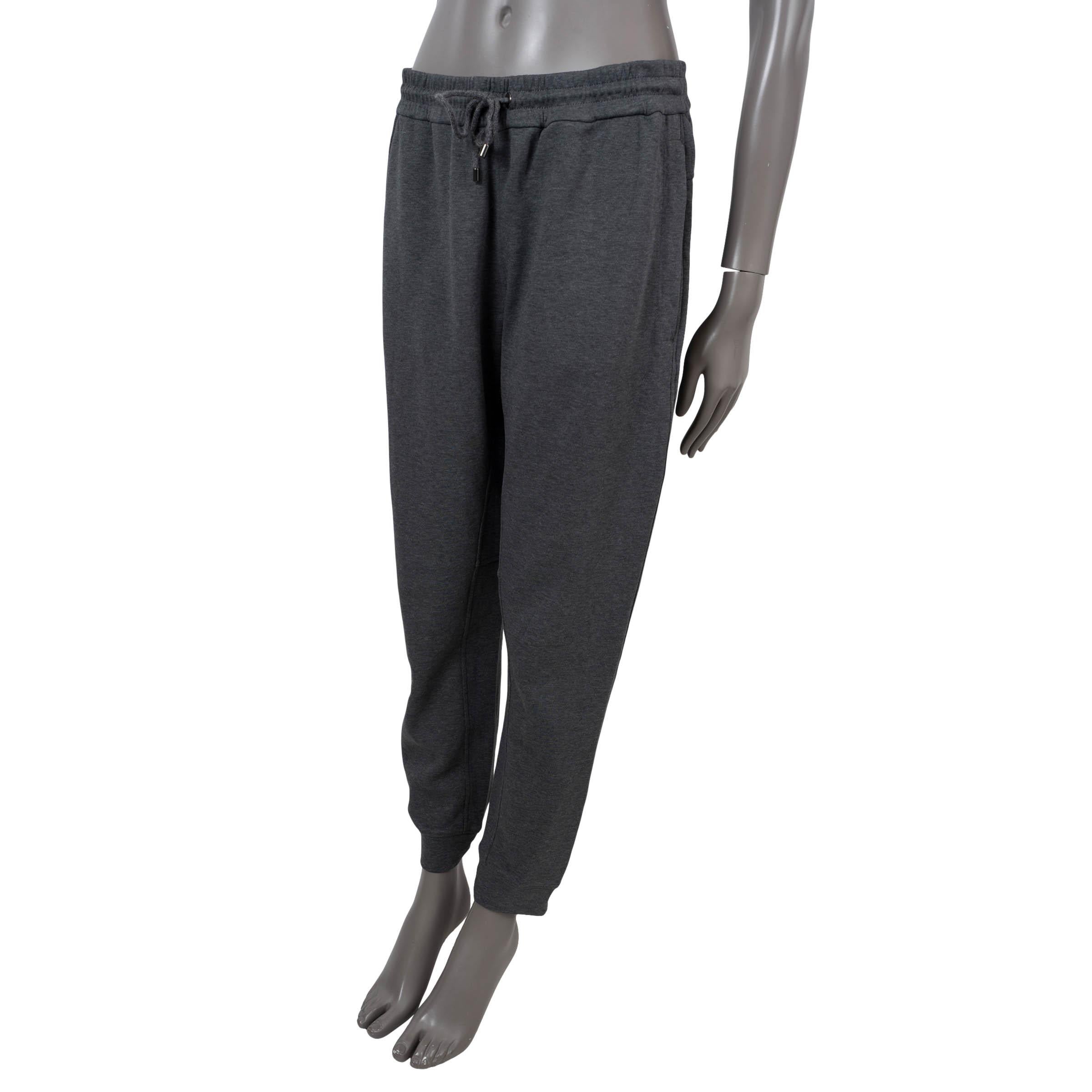 100% authentic Brunello Cucinelli sweatpants in grey jersey cotton (74%) and polyamide (26%). Feature a tapered leg, elastic cuffs and waist with drawstring and two zip pockets at the sides. Have been worn and are in excellent