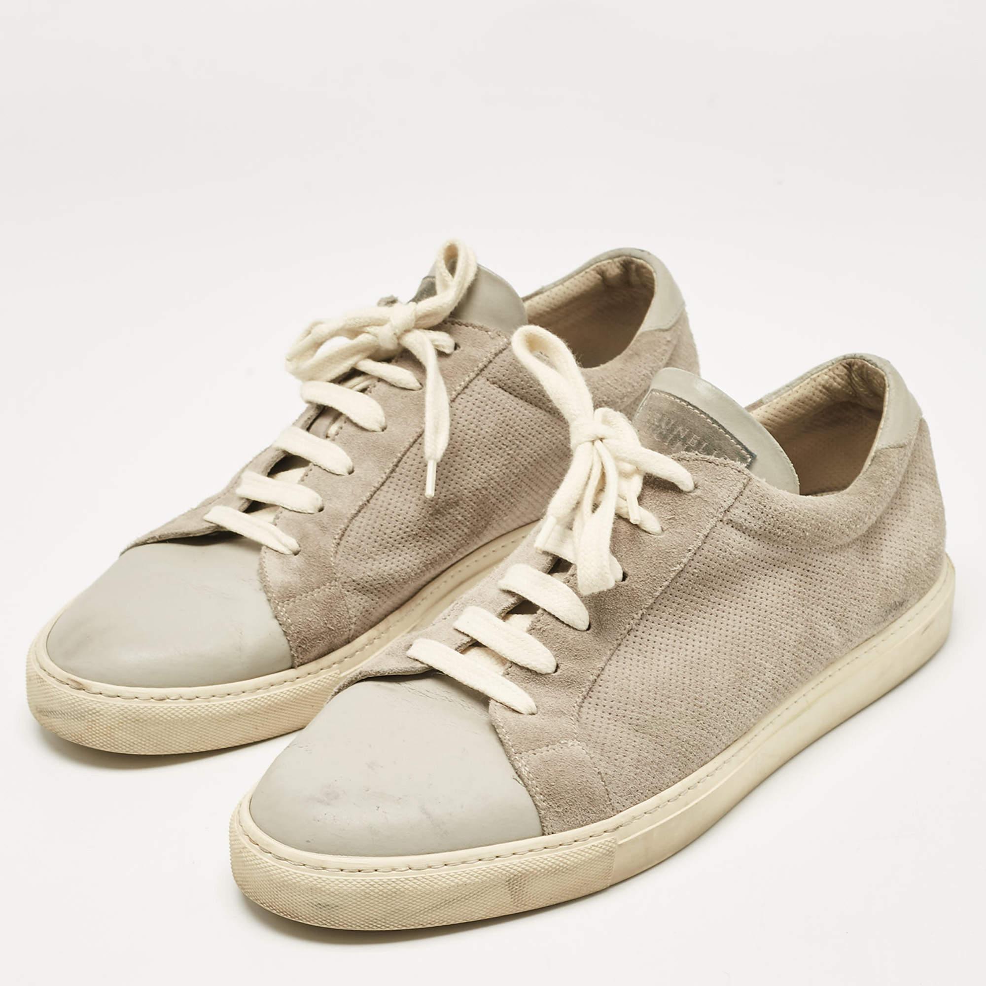 Coming in a classic silhouette these designer sneakers are a seamless combination of luxury comfort and style. These sneakers are designed with signature details and comfortable insoles.