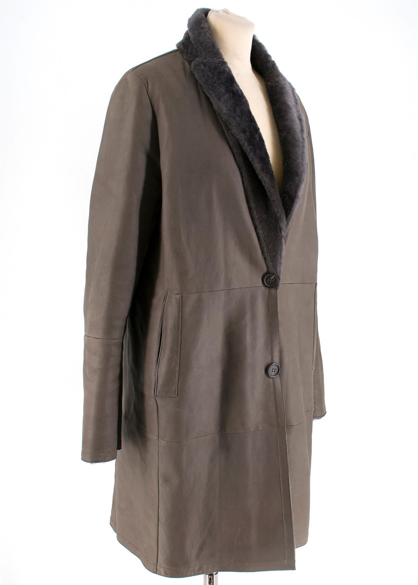 Brunello Cucinelli Grey Reversible Fur/Leather Jacket RRP £6000

- Pockets on each side
- Button fastening
- 100% Sheepskin
- 92% Silk, 8% Elastane
- Made in Italy 

Please note, these items are pre-owned and may show signs of being stored even when