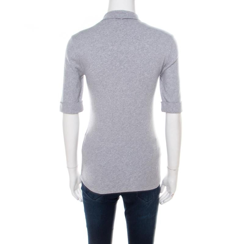 Brunello Cucinelli tops are an example of quality and comfort. This grey number is for those who dare to express themselves in the most fashionable manner. This cotton-blend piece is an absolute must-have in your everyday wardrobe.

Includes: The