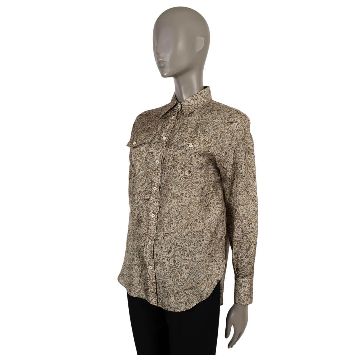 100% authentic Brunello Cucinelli paisley blouse in grey silk (100%). Features two flap chest pockets. Closes with mother-of-pearl buttons. Has been worn and is in excellent condition.

Measurements
Tag Size	XS
Size	XS
Shoulder Width	48cm