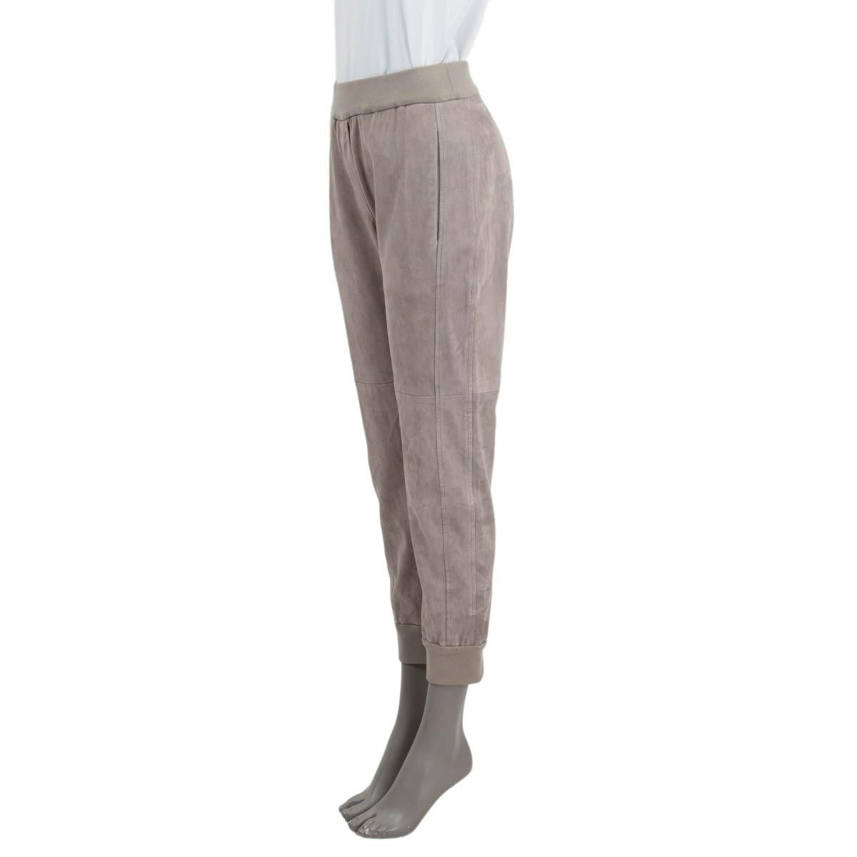 100% authentic Brunello Cucinelli jogger pants in gray suede (100%). Feature two slit pockets on the side, an elastic waist band and elastic cuffs. Unlined. Have been worn once or twice and are in virtually new condition.

Measurements
Tag
