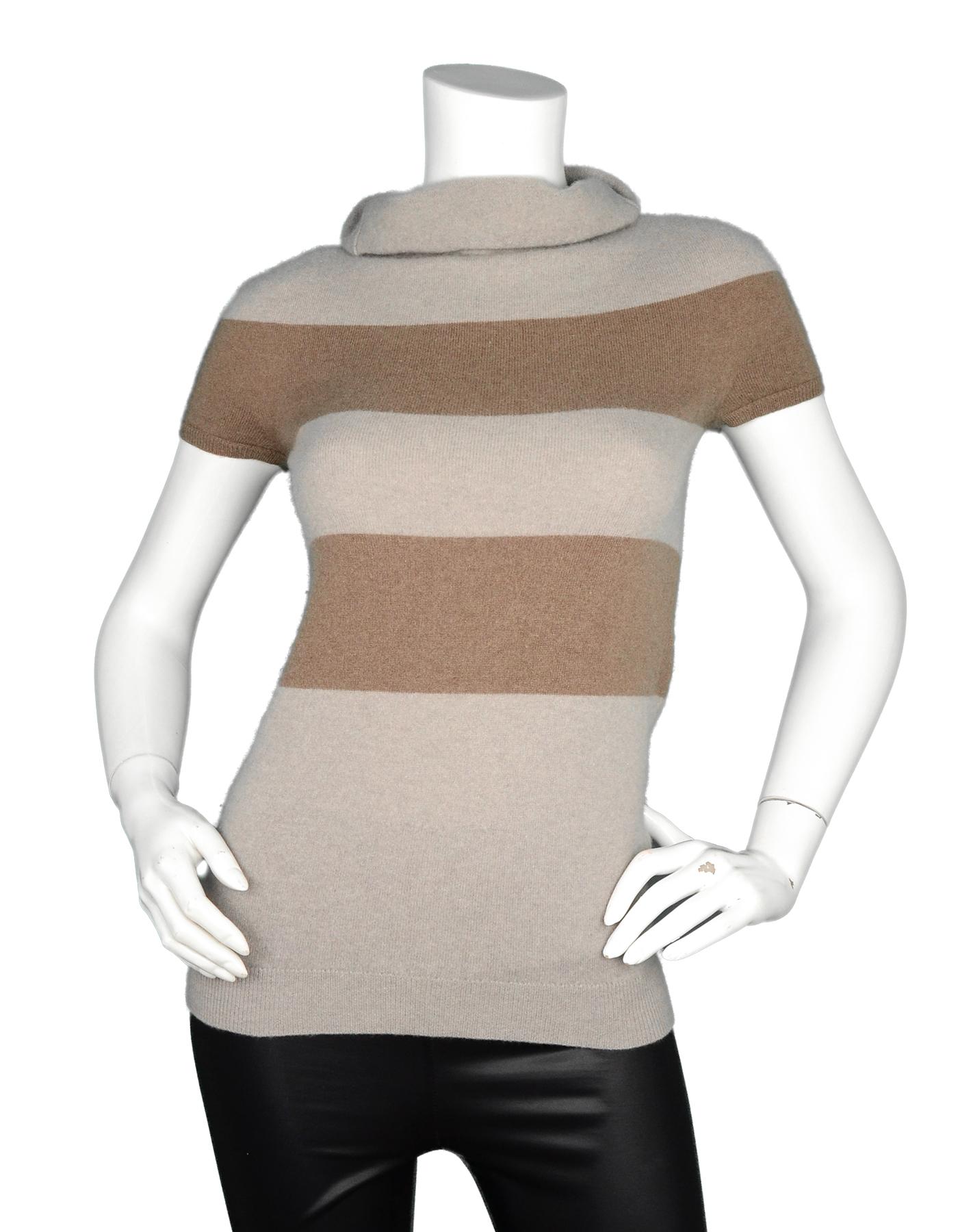 Brunello Cucinelli Grey/Tan Cashmere Short Sleeve Turtleneck Sweater Sz XS

Made In: Italy  
Color: Grey, tan
Materials: 100% cashmere
Opening/Closure: Pull over
Overall Condition: Excellent pre-owned condition with excpetion of minor pilling in