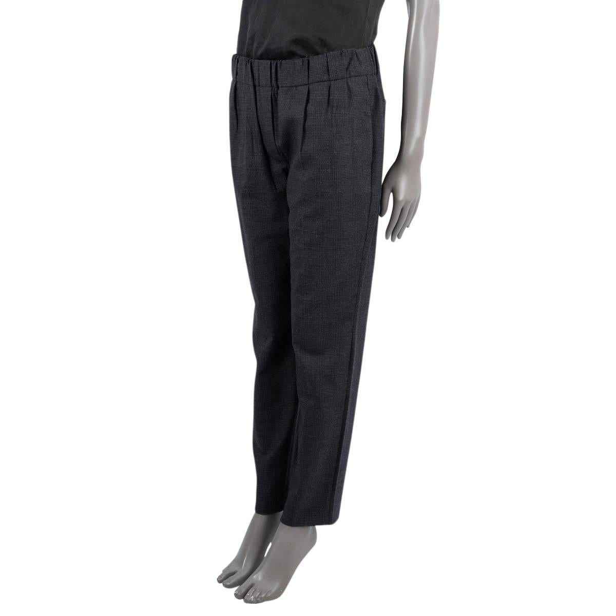 100% authentic Brunello Cucinelli check pants in black and anthracite wool (98%) and elastane (2%) with elastic band at the waist-line and slit pockets on the sides and back. Unlined. Have been worn and are in excellent condition.

Measurements
Tag