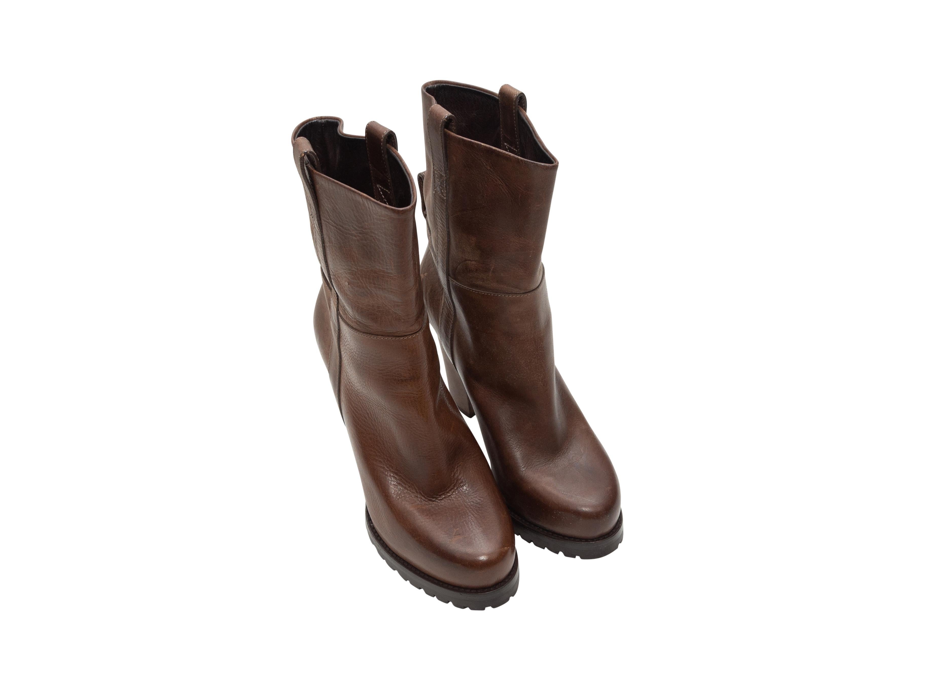 Product details: Brown leather mid-calf round-toe heeled boots by Brunello Cucinelli. Covered heels. Designer size 39. 4.5