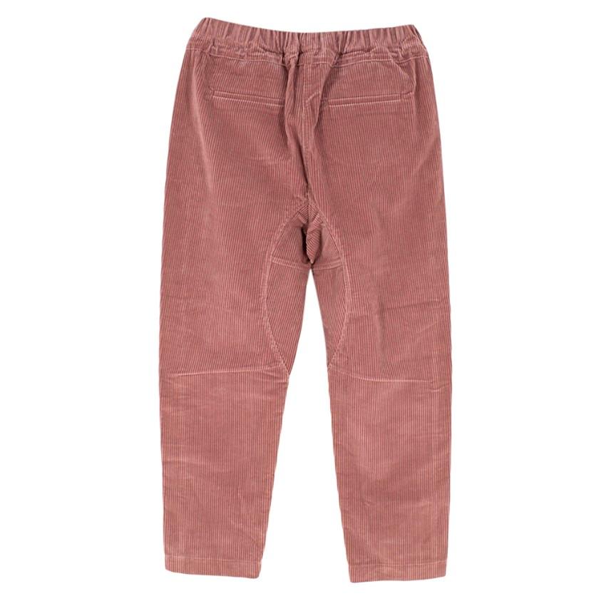 Brunello Cucinelli Mauve Corduroy Jogger Style Trousers. RRP £1295

- Elasticated waistband with drawstring tie
- 2 front pocket and 2 back 
- Ribbed corduroy finish

Material
100% Cotton 

Dry Clean Only 

Made in Italy 

Please note, these items