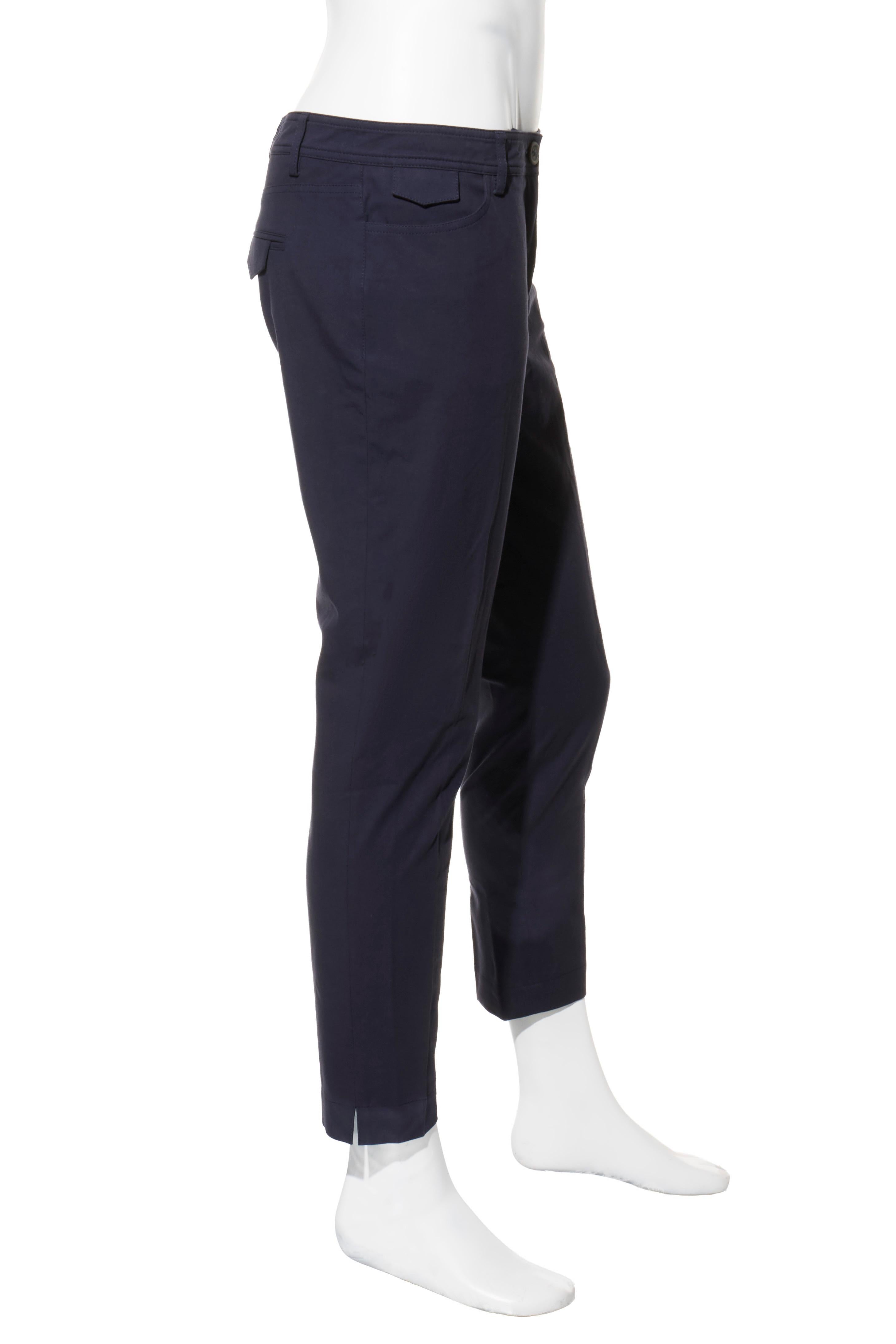 Brunello Cucinelli Navy Blue Cotton-Stretch Tailored Pants, Size IT 48 / US 32

Description:
Elevate your wardrobe with these impeccably tailored Brunello Cucinelli trousers, a timeless expression of Italian craftsmanship and understated luxury.