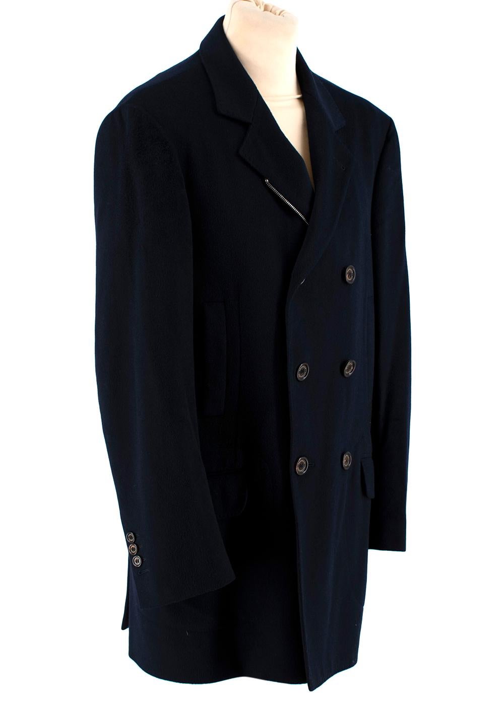 Brunello Cucinelli Navy Cashmere Double Breasted Coat

-Luxurious soft touch 
-Both Buttons and zip fastening for extra comfort
-Classic cut with modern accents
-4 functional outer pockets 
-5 inner pockets, one of them for pens.
-Fully lined