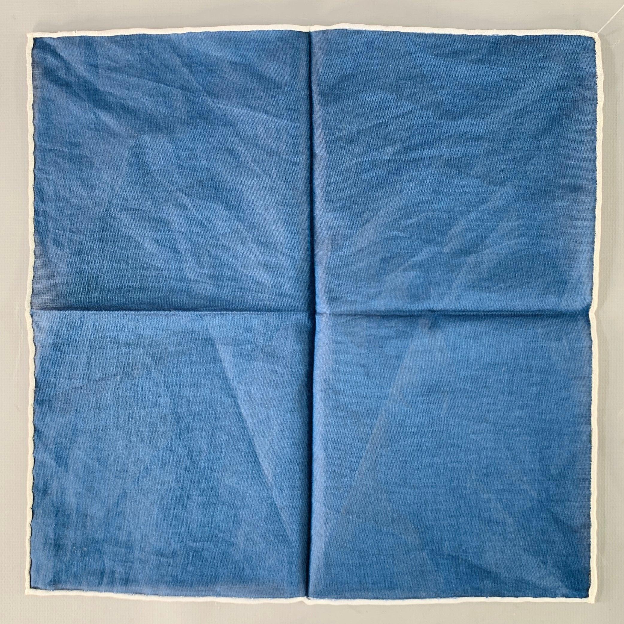 BRUNELLO CUCINELLI pocket square
in a sheer navy and white woven fabric featuring hand rolled edges.Very Good Pre-Owned Condition. Brand tag removed by previous owner. 

Measurements: 
  11.25 inches  x 11.25 inches 
  
  
 
Sui Generis Reference: