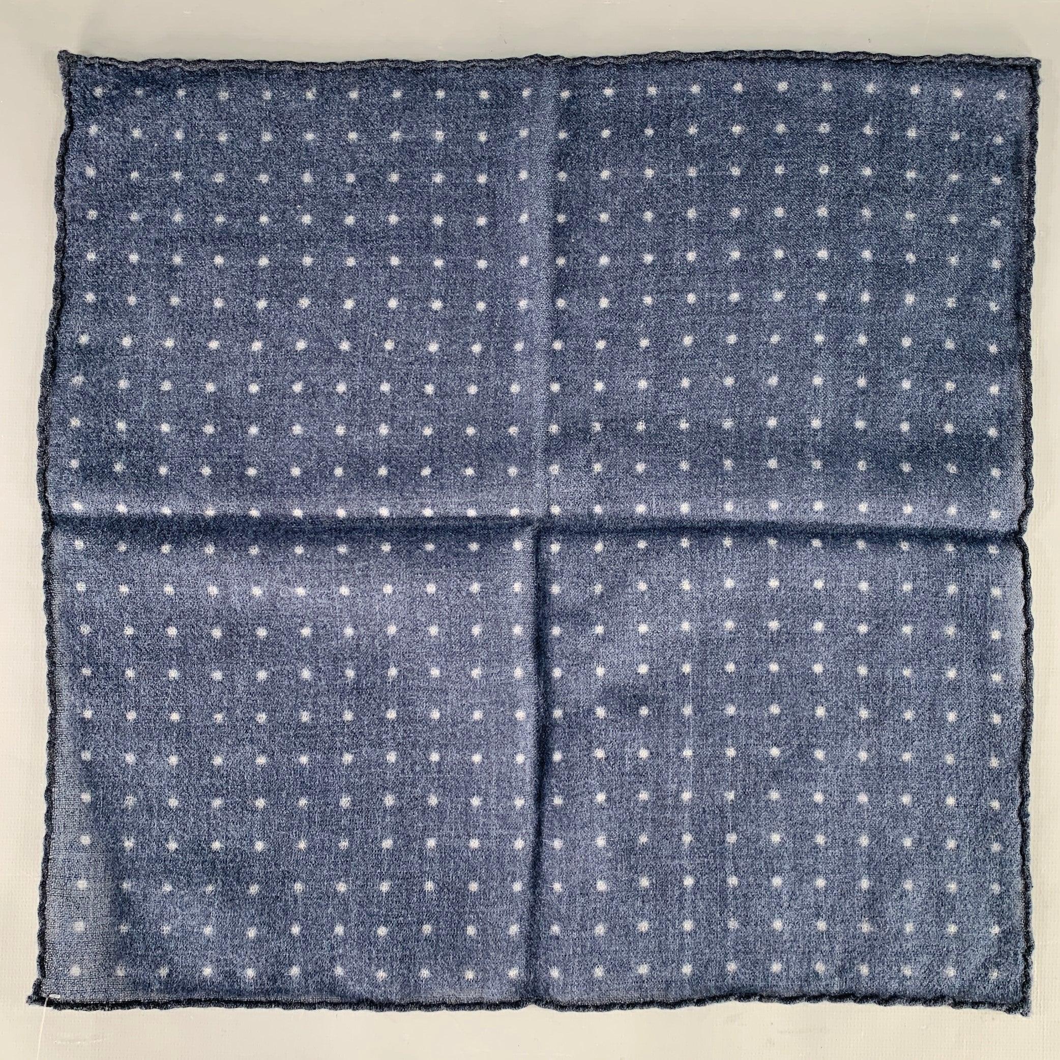 BRUNELLO CUCINELLI pocket square
in a navy and white woven fabric featuring a polka dot pattern and hand rolled edges.Very Good Pre-Owned Condition. Brand tag removed by previous owner. 

Measurements: 
  15 inches  x 14.5 inches 
  
  
 
Sui
