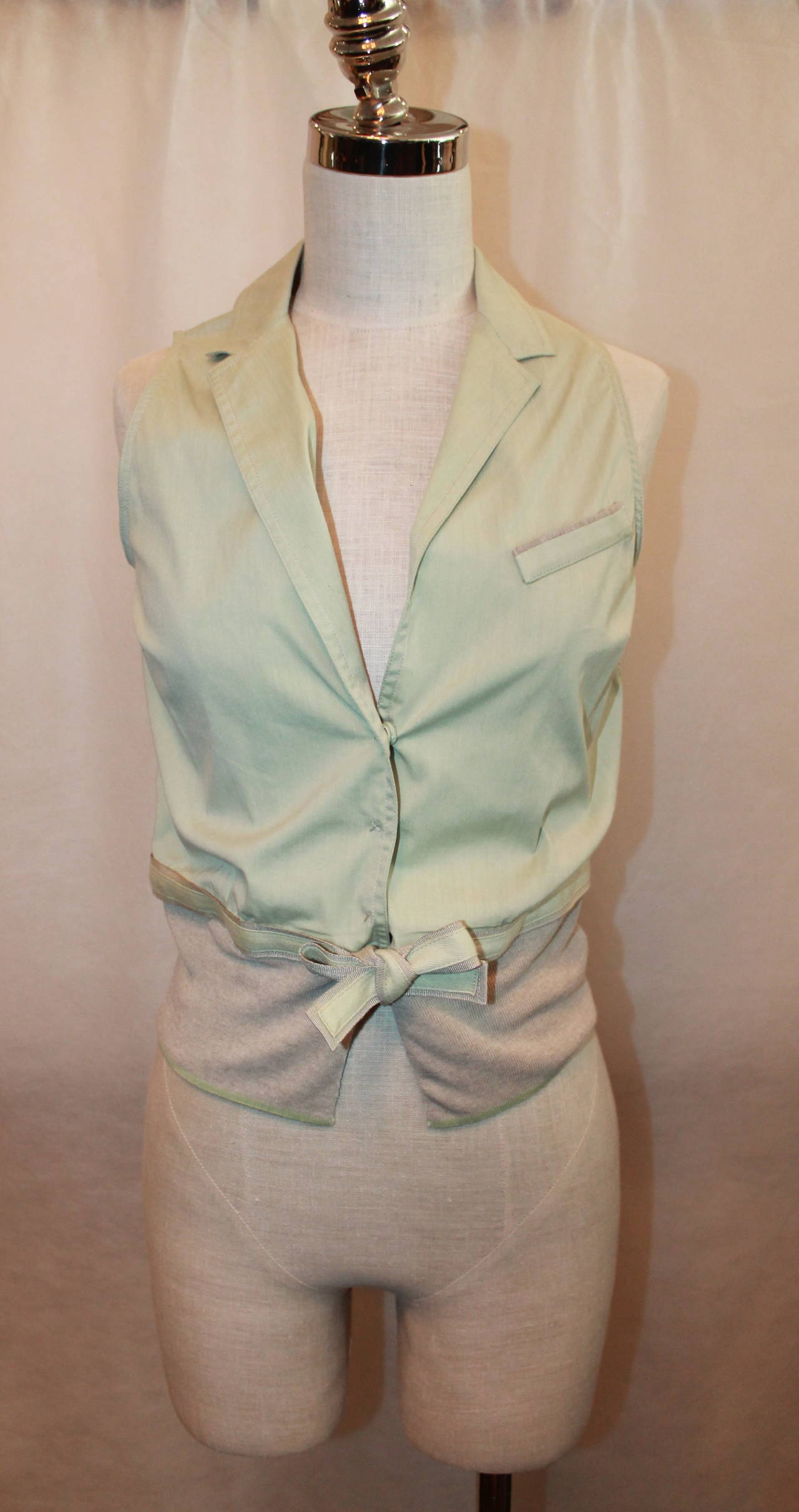 Brunello Cucinelli Pastel Green & Beige Linen Blouse - S. This blouse is in excellent condition and buttons up. The bottom is a tight, stretch material and ties. 

Measurements:
Bust- 34