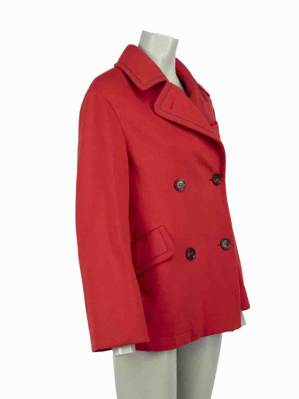 CONDITION is Very good. Minimal wear to coat is evident. Minimal wear to the rear with mark above the hem on this used Brunello Cucinelli designer resale item.
 
Details
Red
Cotton
Short length peacoat
Double breasted
Beads accent
2x Front side