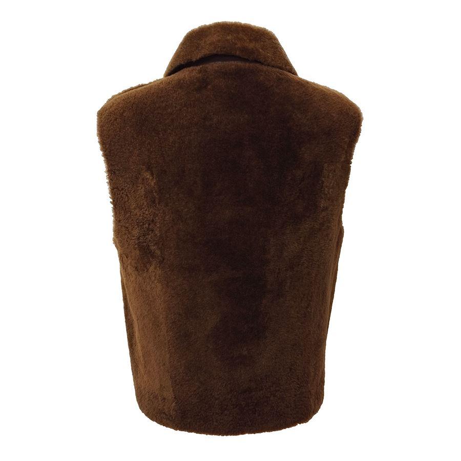 Sheepskin Brown color Zip closure Two pockets Total length cm 70 (26,77 inches)
