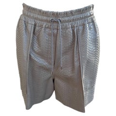 Pantalones cortos Brunello Cucinelli en phyton nuevo con etiqueta