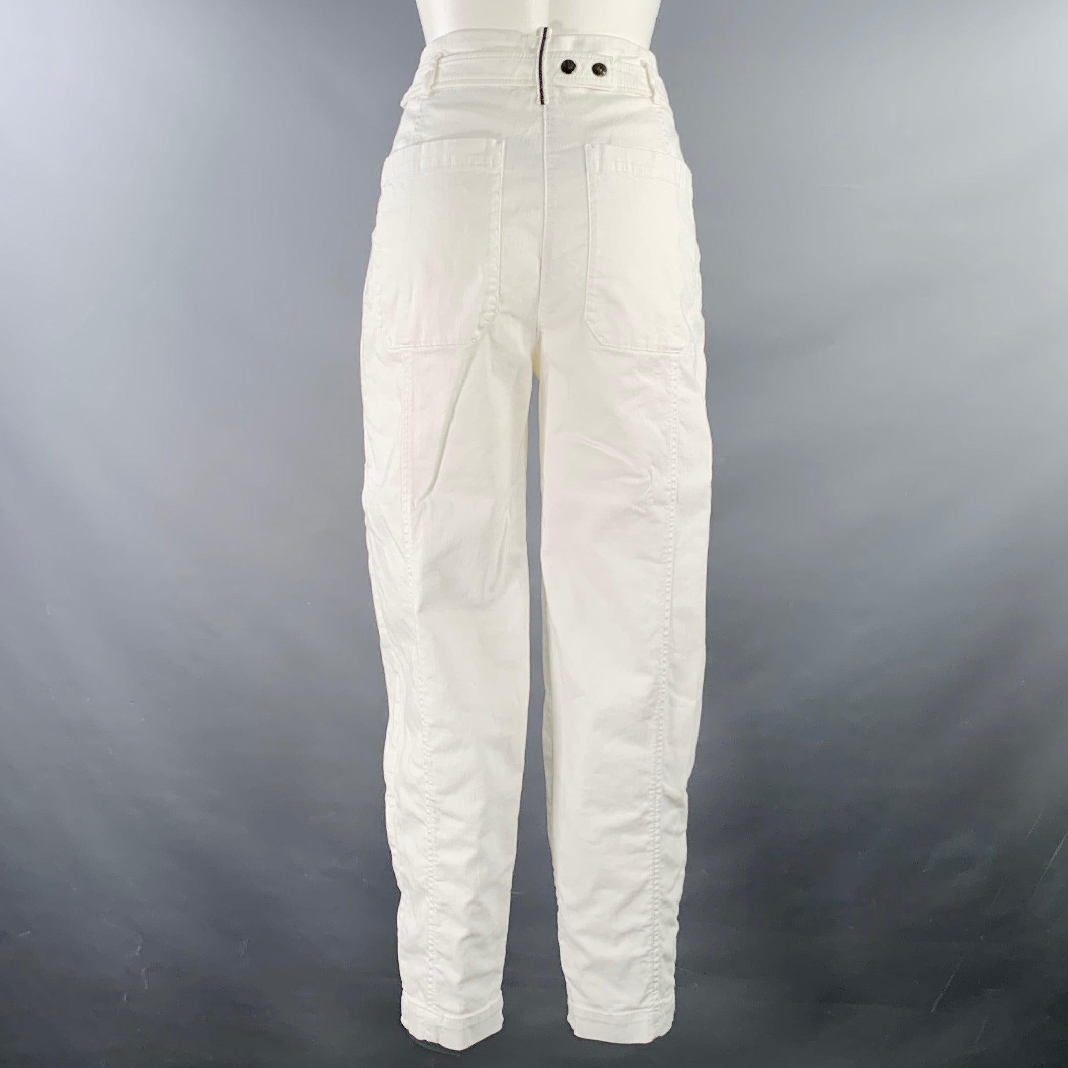 BRUNELLO CUCINELLI jeans
in a cream cotton blend denim featuring a pleated style, tapered leg, and zip fly closure. Note the signature monili beading detail on back belt loop. Made in Italy.Excellent Pre-Owned Condition. 

Marked:   IT 36