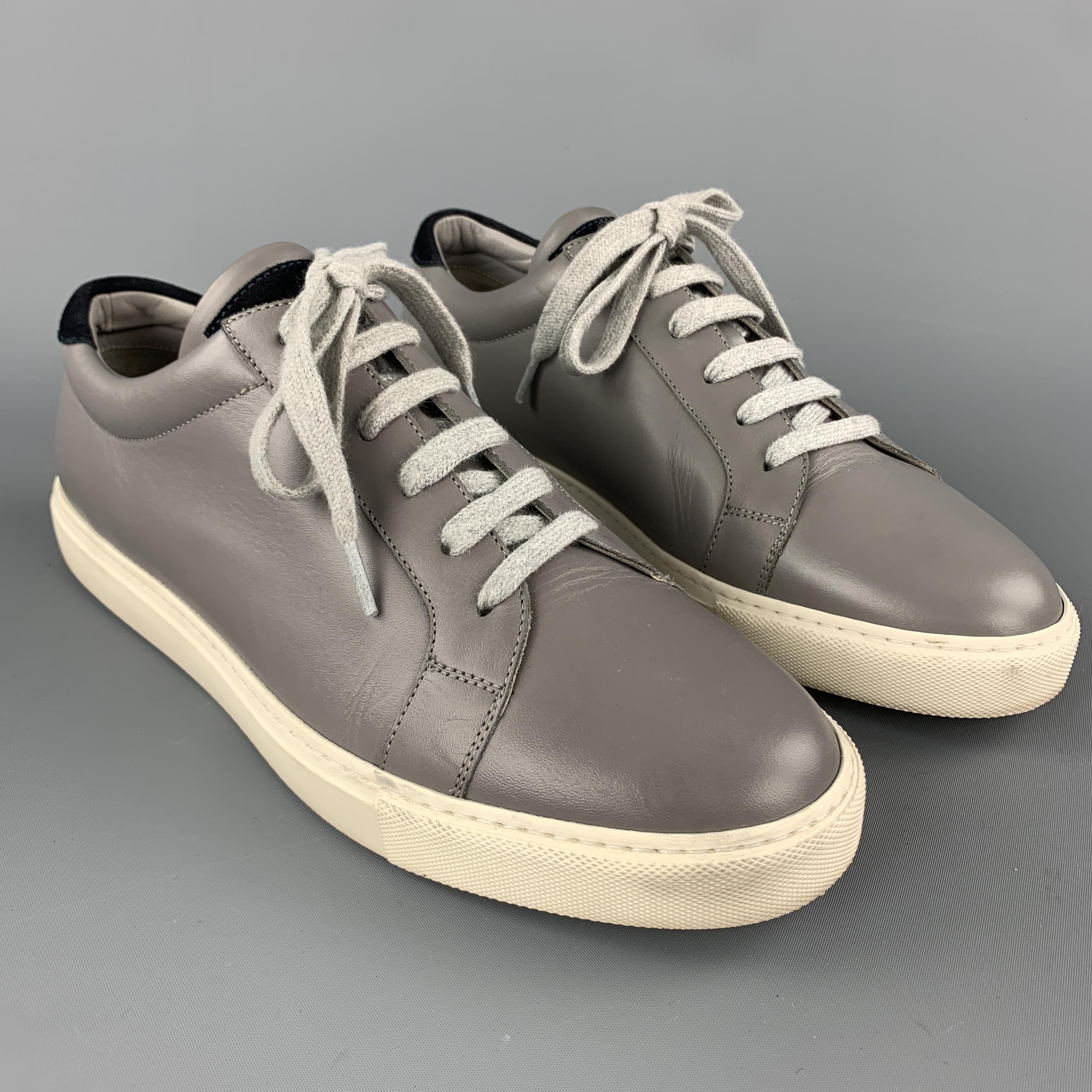 BRUNELLO CUCINELLI low top sneakers come in gray leather with navy suede back and white rubber sole. Made in Italy.

Very Good Pre-Owned Condition.
Marked: IT 43

Outsole: 11.75 x 4 in.