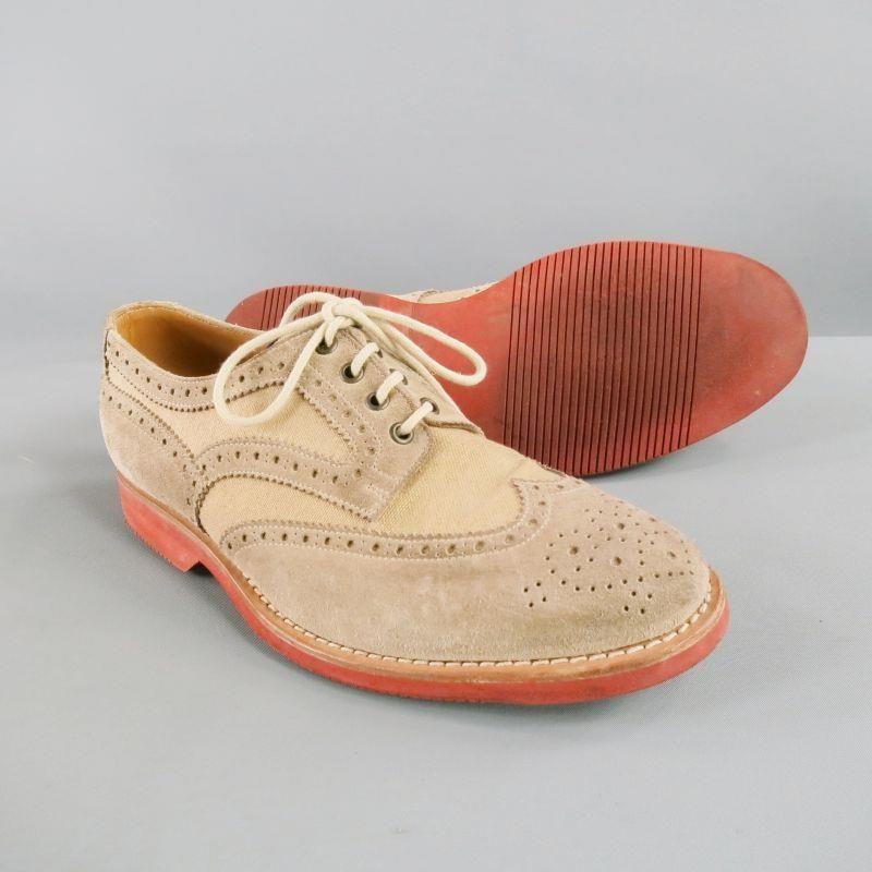 BRUNELLO CUCINELLI casual shoes comes in a taupe suede with a canvas trim featuring a wingtip style, perforated, and a lace up closure. Made in Italy.

Good Pre- Owned Condition.
Marked as: IT 43
Original Retail Price: $995.00

Measurements:

Heel: