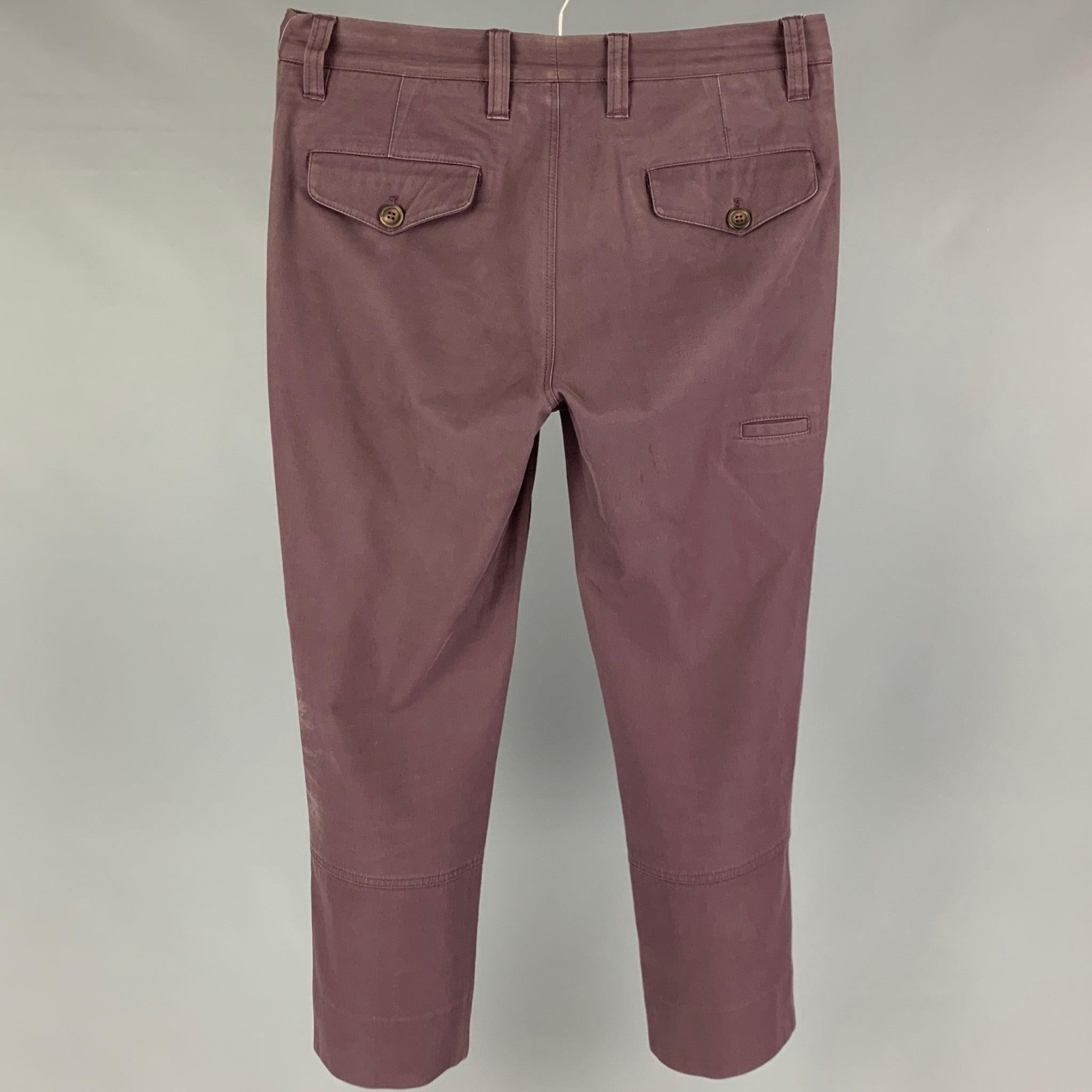 BRUNELLO CUCINELLI pants comes in a eggplant cotton featuring a flat front, slim fit, and a zip fly closure. Made in Italy.
Good
Pre-Owned Condition. Light wear. As-is. 

Marked:   46 

Measurements: 
  Waist: 32 inches  Rise: 9.5 inches Inseam: 26