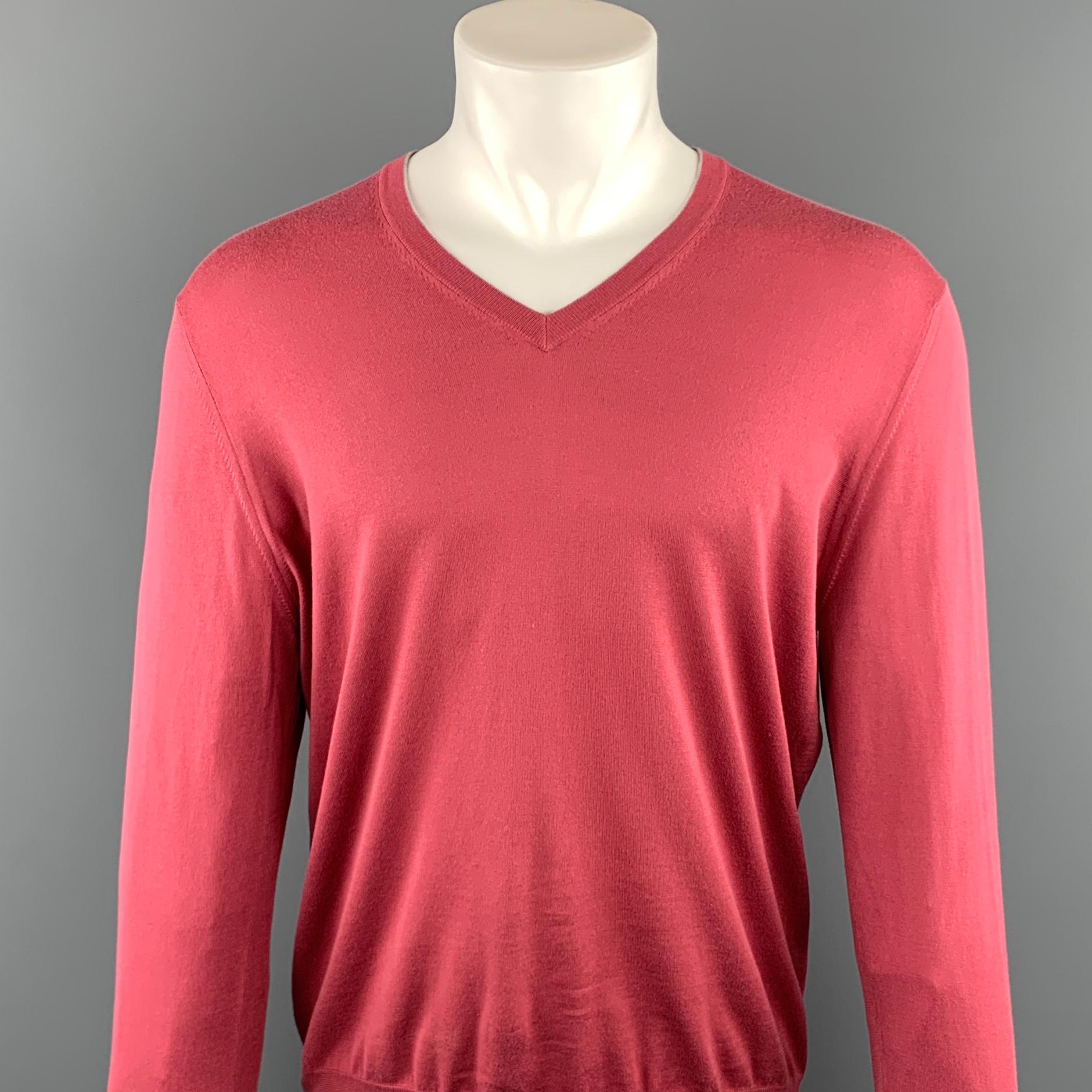 BRUNELLO CUCINELLI pullover comes in a salmon cotton featuring a v-neck. Made in Italy.

Excellent Pre-Owned Condition.
Marked: IT 50 

Measurements:

Shoulder: 19 in. 
Chest: 46 in. 
Sleeve: 27 in.
Length: 26.5 in. 