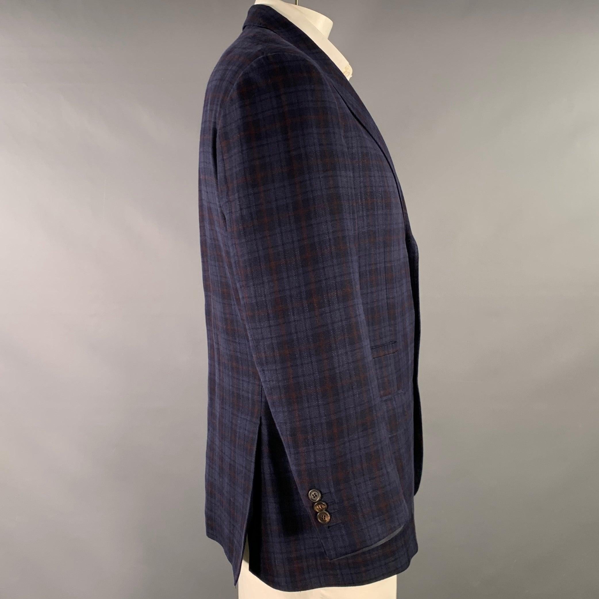 BRUNELLO CUCINELLI sport coat
in a
navy and brown linen blend fabric featuring a plaid pattern, peak lapel, double vented back, and three button closure. Made in Italy.Excellent Pre-Owned Condition. 

Marked:   IT 56 

Measurements: 
 
Shoulder: