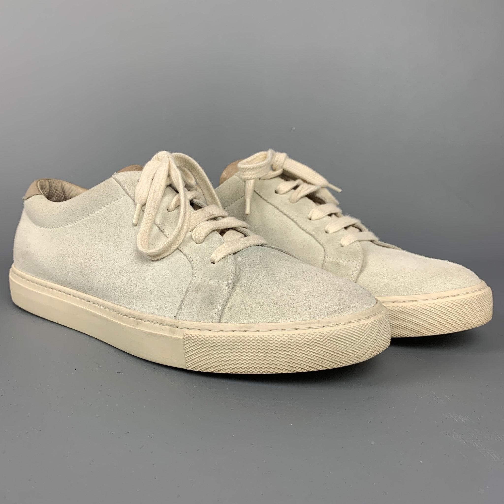 BRUNELLO CUCINELLI sneakers comes in a sea foam suede with a taupe leather trim featuring a rubber sole and a lace up closure. Made in Italy.Very Good
Pre-Owned Condition. 

Marked:   EU 40.5Outsole: 4 inches  x 11 inches 
  
  
 
Reference: