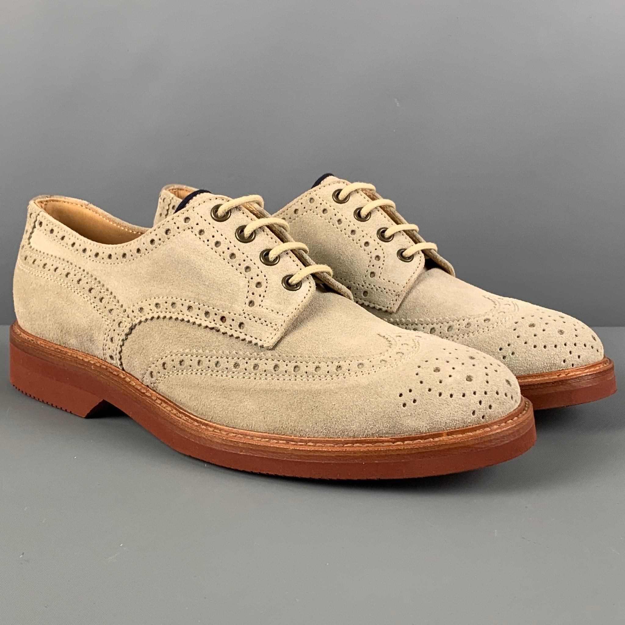 BRUNELLO CUCINELLI shoes comes in a beige suede featuring a wingtip style, brown sole, and a lace up closure. Made in Italy. 

New with box.
Marked: 42.5

Outsole: 12 in. x 4.25 in.
 