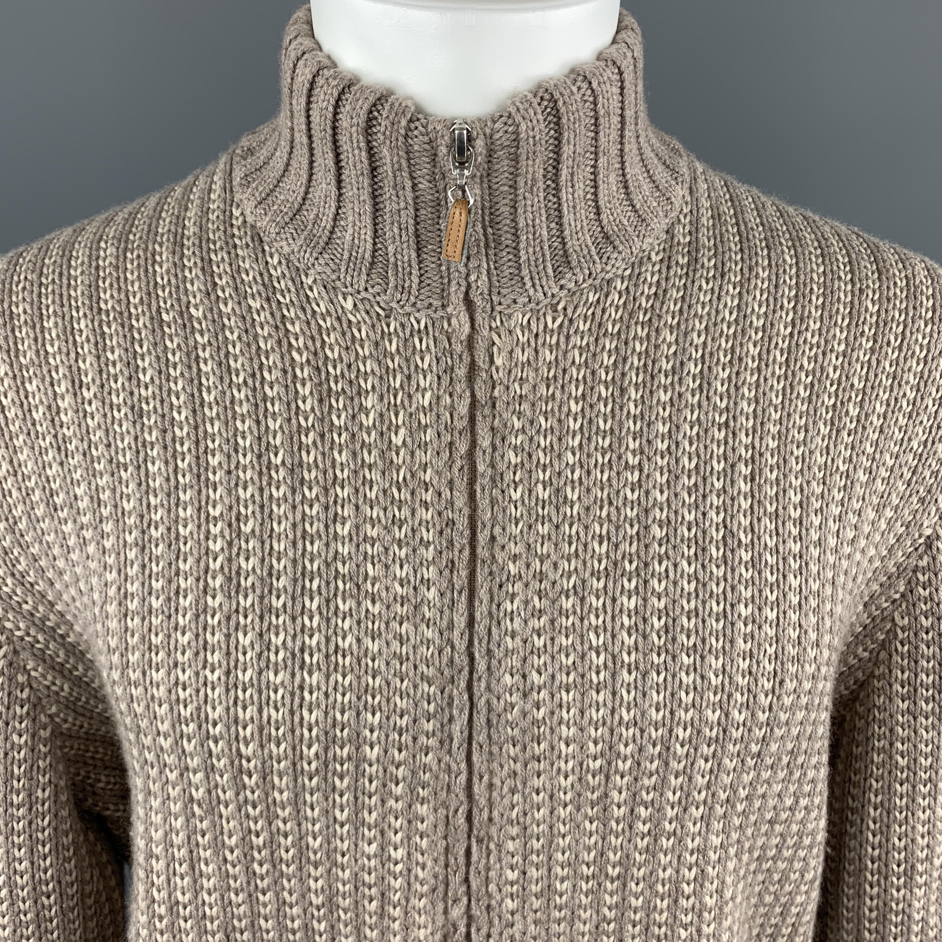 BRUNELLO CUCINELLI cardigan jacket comes in taupe and cream cashmere knit with a high mock neck and double zip front. Made in Italy.

Excellent Pre-Owned Condition.
Marked: IT 52

Measurements:

Shoulder: 17 in.
Chest: 44 in.
Sleeve: 27 in.
Length: