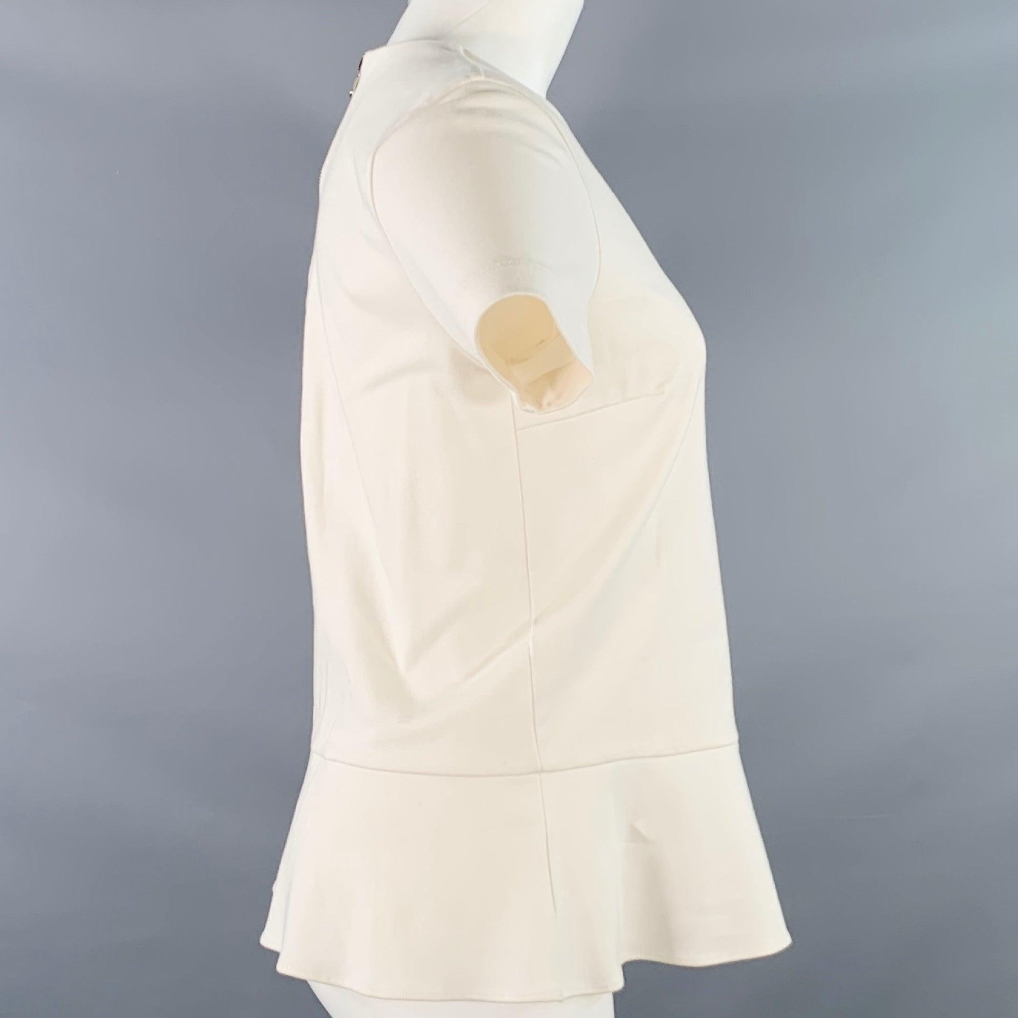 BRUNELLO CUCINELLI lässiges Oberteil
aus einer cremefarbenen Baumwoll-Stretchmischung mit Schößchen, kurzen Ärmeln und Reißverschluss am Rücken. Made in Italy. sehr guter gebrauchter Zustand mit Tags. Mehrere kleine Flecken. 

Markiert:   M