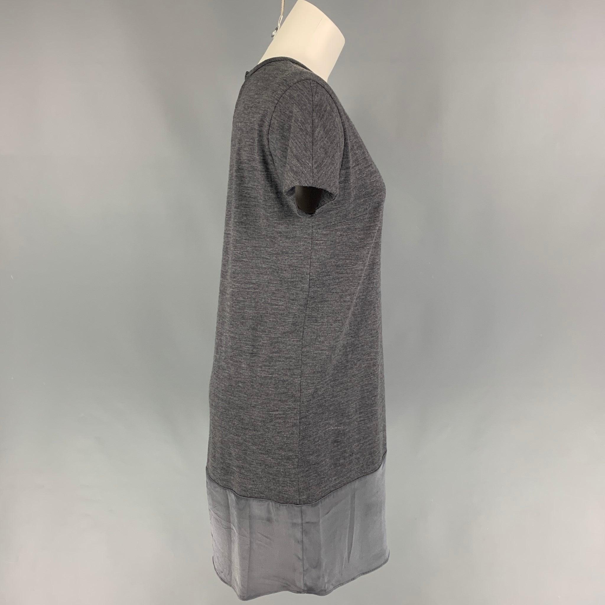 BRUNELLO CUCINELLI dress comes in a grey wool featuring a shift style, short sleeves, and a satin panel. Made in Italy.
Very Good
Pre-Owned Condition. 

Marked:   M  

Measurements: 
 
Shoulder: 16.5 inches  Bust: 38 inches Hip: 38 inches  Sleeve: