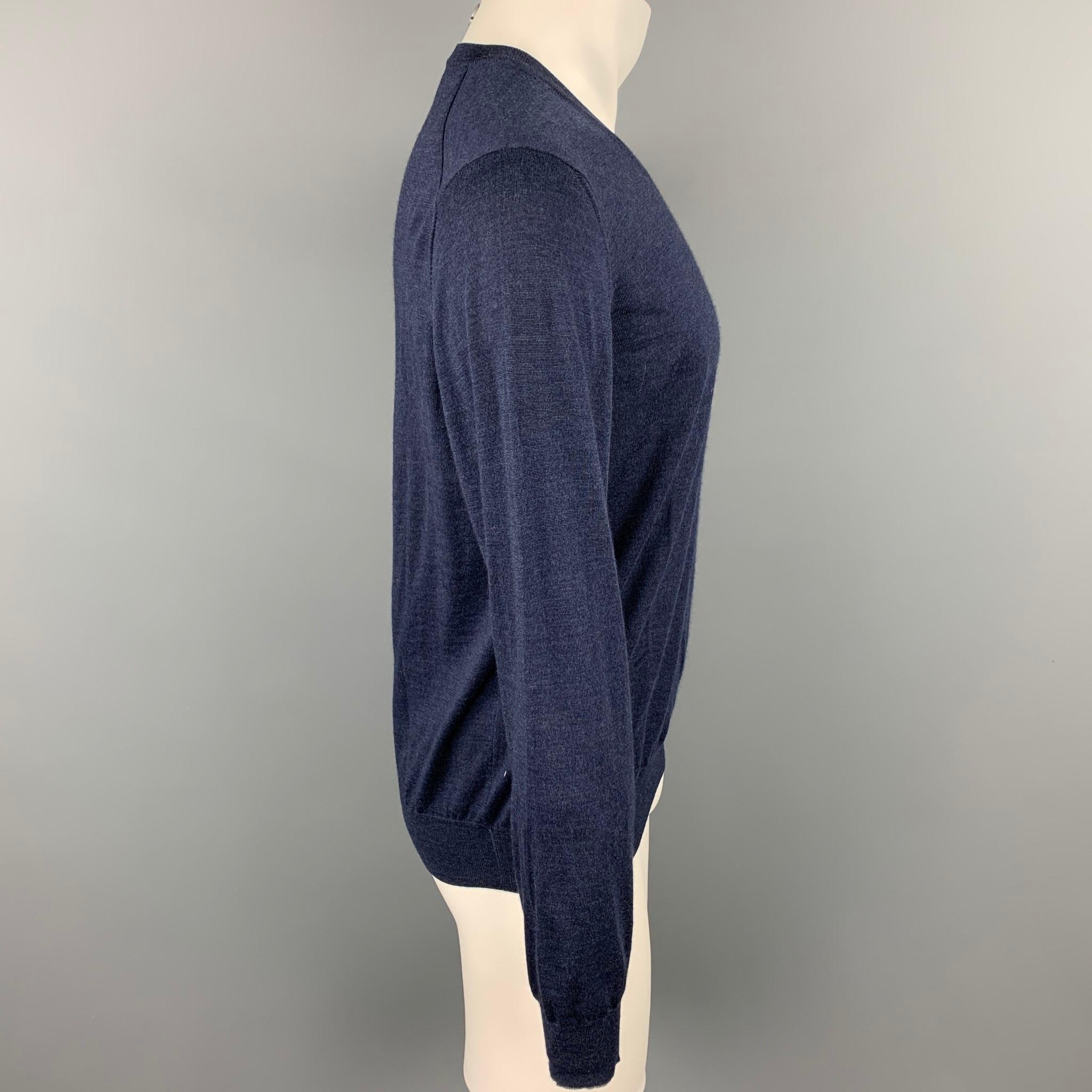 BRUNELLO CUCINELLI pullover sweater comes in a navy wool / cashmere featuring a v-neck. Made in Italy.

Very Good Pre-Owned Condition.
Marked: IT 50

Measurements:

Shoulder: 17.5 in.
Chest: 44 in.
Sleeve: 27 in.
Length: 25 in.