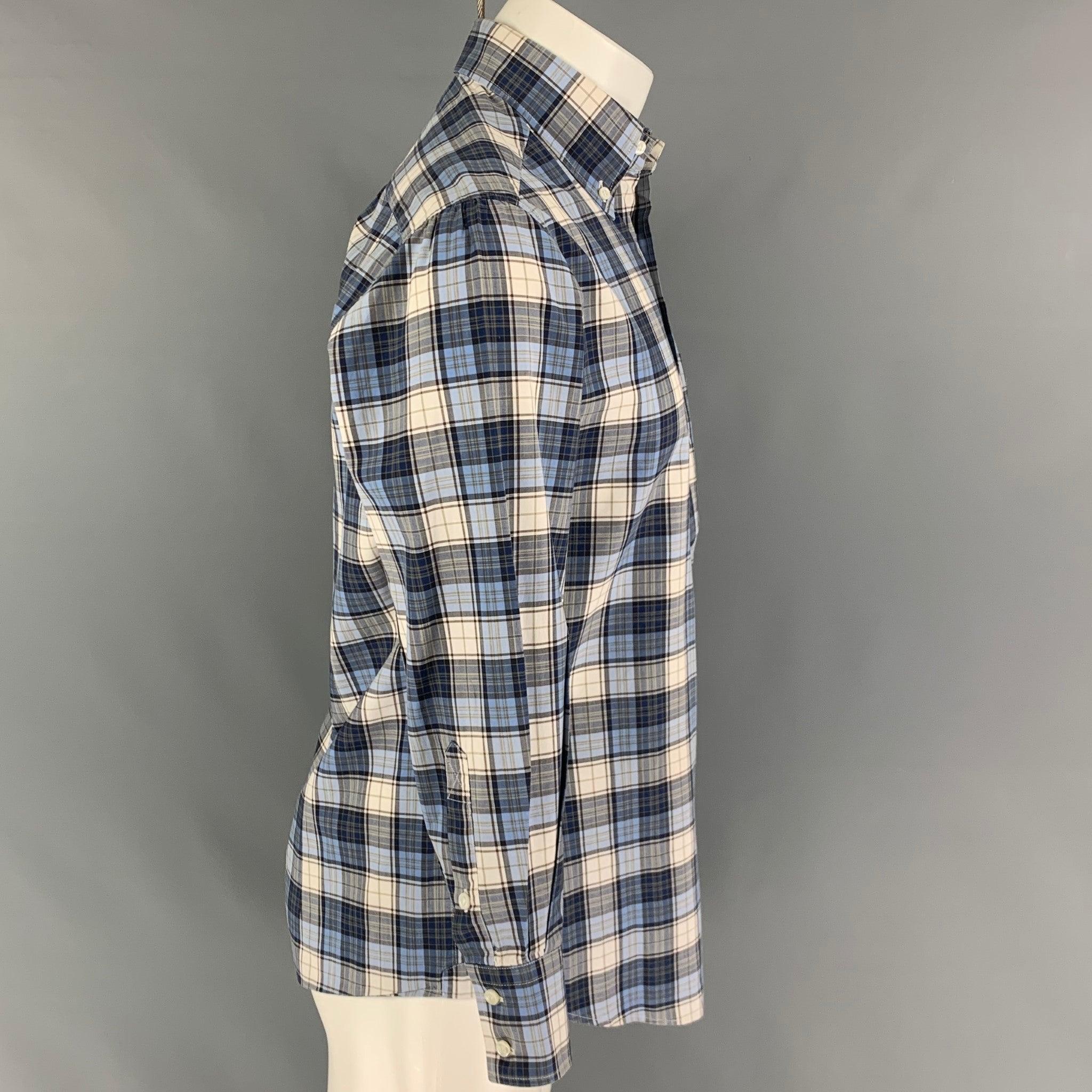 BRUNELLO CUCINELLI long sleeve shirt comes in a blue & navy plaid cotton button down collar, patch pocket, and a button down collar. Made in Italy.
Very Good
Pre-Owned Condition.  

Marked:   S 

Measurements: 
 
Shoulder: 18 inches  Chest: 40
