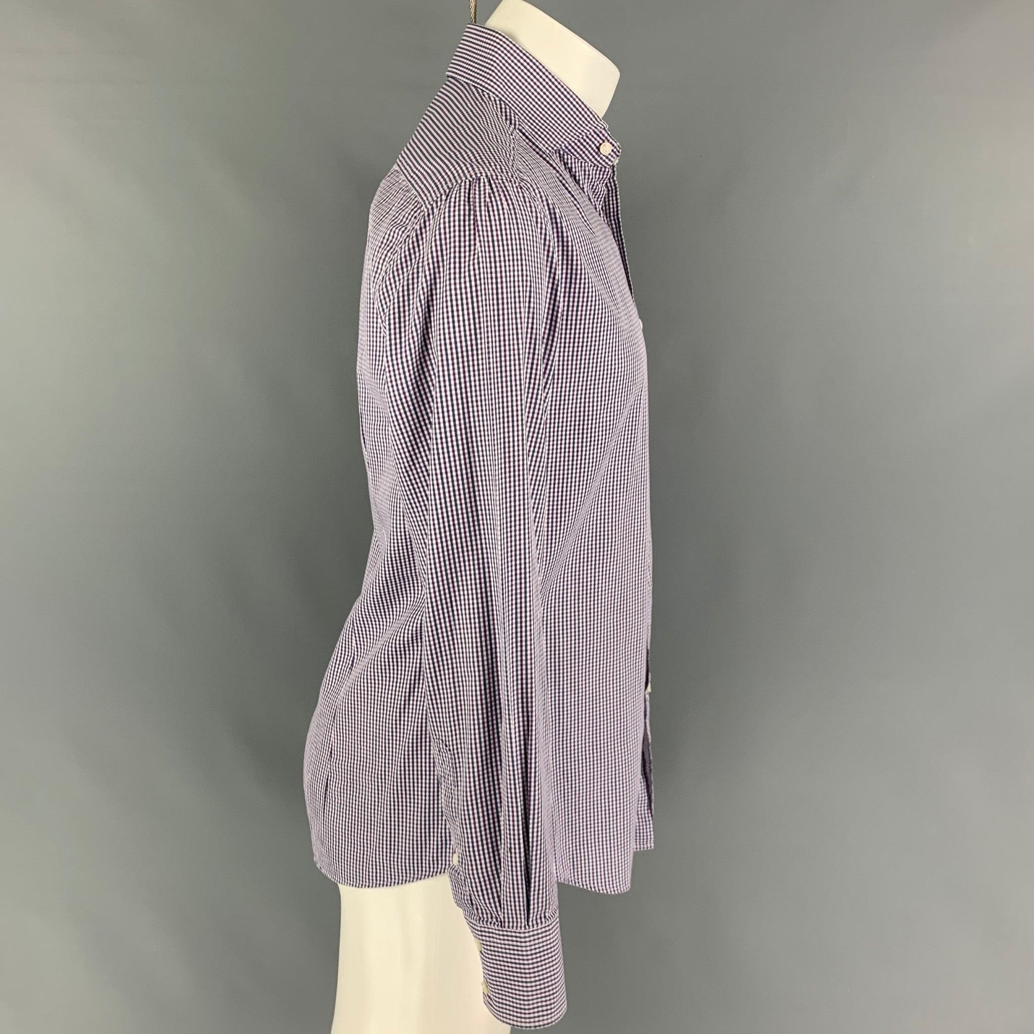 BRUNELLO CUCINELLI long sleeve shirt comes in a navy & purple checkered cotton featuring a slim fit, spread collar, and a button up closure. Made in Italy.
Very Good
Pre-Owned Condition.  

Marked:   M 

Measurements: 
 
Shoulder: 18 inches  Chest: