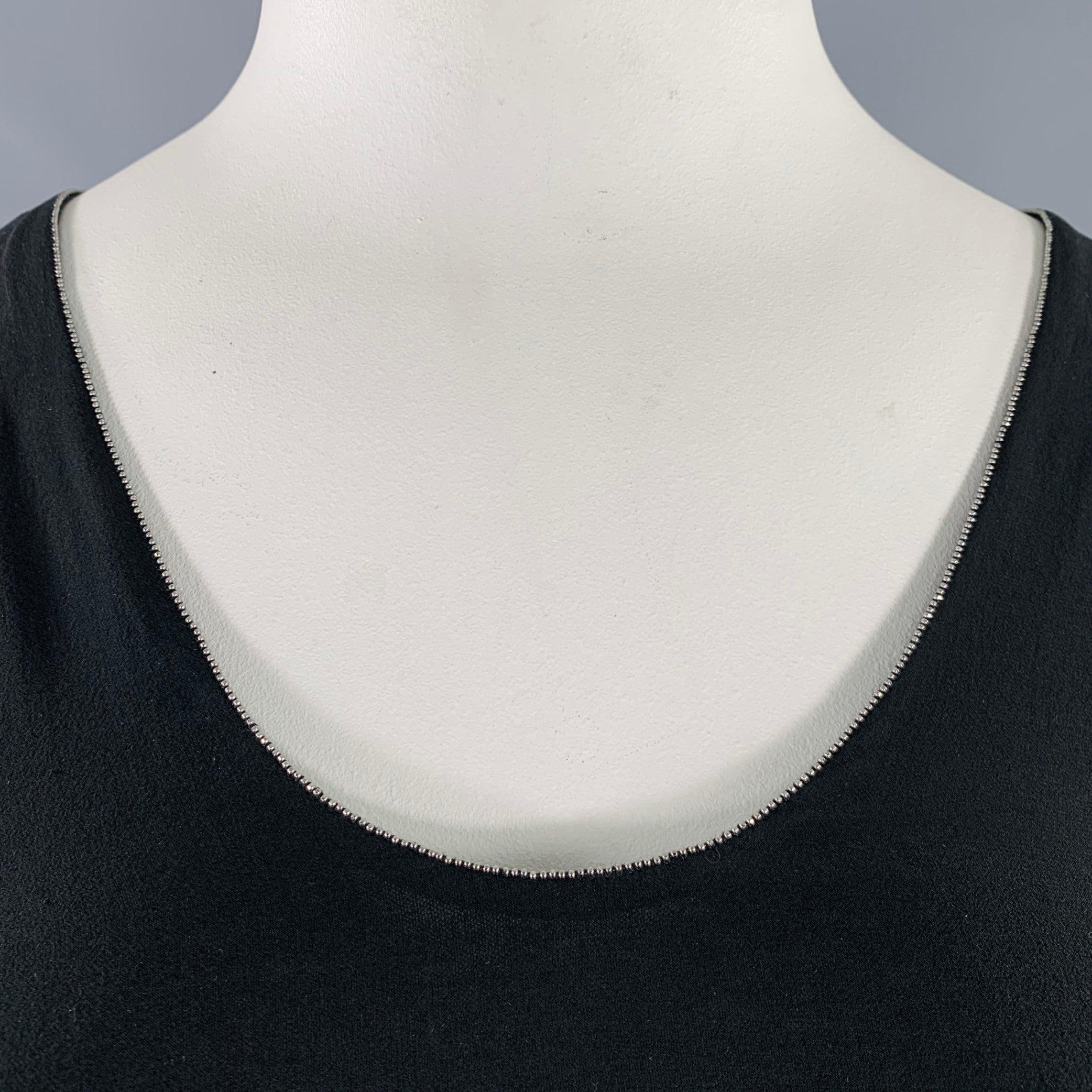 BRUNELLO CUCINELLI dress top
in a black silk featuring a sheer style with linen blend underlayer, flutter sleeves, and silver tone Monili bead trim at neckline. Made in Italy.Excellent Pre-Owned Condition. 

Marked:   XL 

Measurements: 
 
Shoulder: