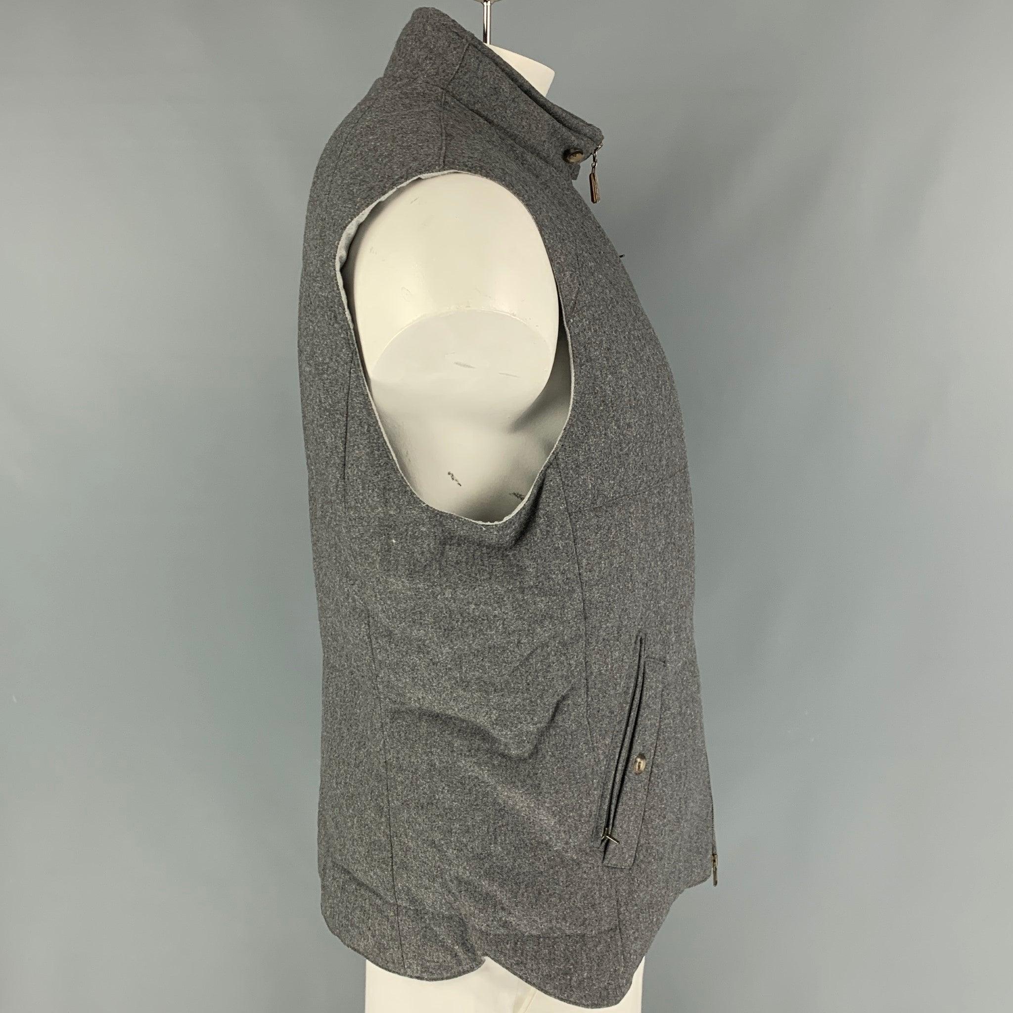 BRUNELLO CUCINELLI vest comes in a grey quilted wool / cashmere featuring a buttoned collar, front pockets, and a zip up closure. Made in Italy. New With Tags.
 

Marked:   XL 

Measurements: 
 
Shoulder: 19 inches  Chest: 48 inches  Length: 28