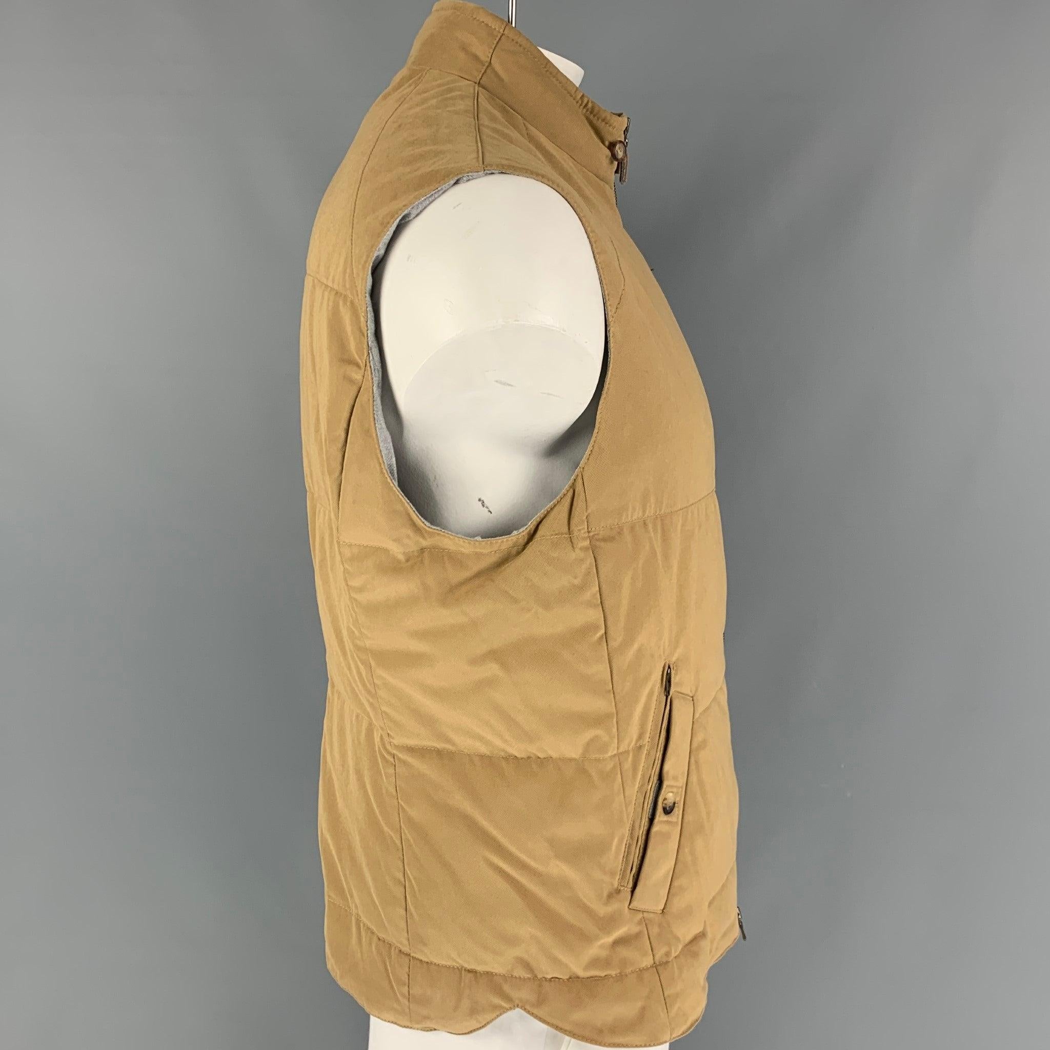 BRUNELLO CUCINELLI vest comes in a khaki quilted wool / cashmere featuring a buttoned collar, front pockets, and a zip up closure. Made in Italy. New With Tags.
 

Marked:   XL 

Measurements: 
 
Shoulder: 19 inches  Chest: 48 inches  Length: 28