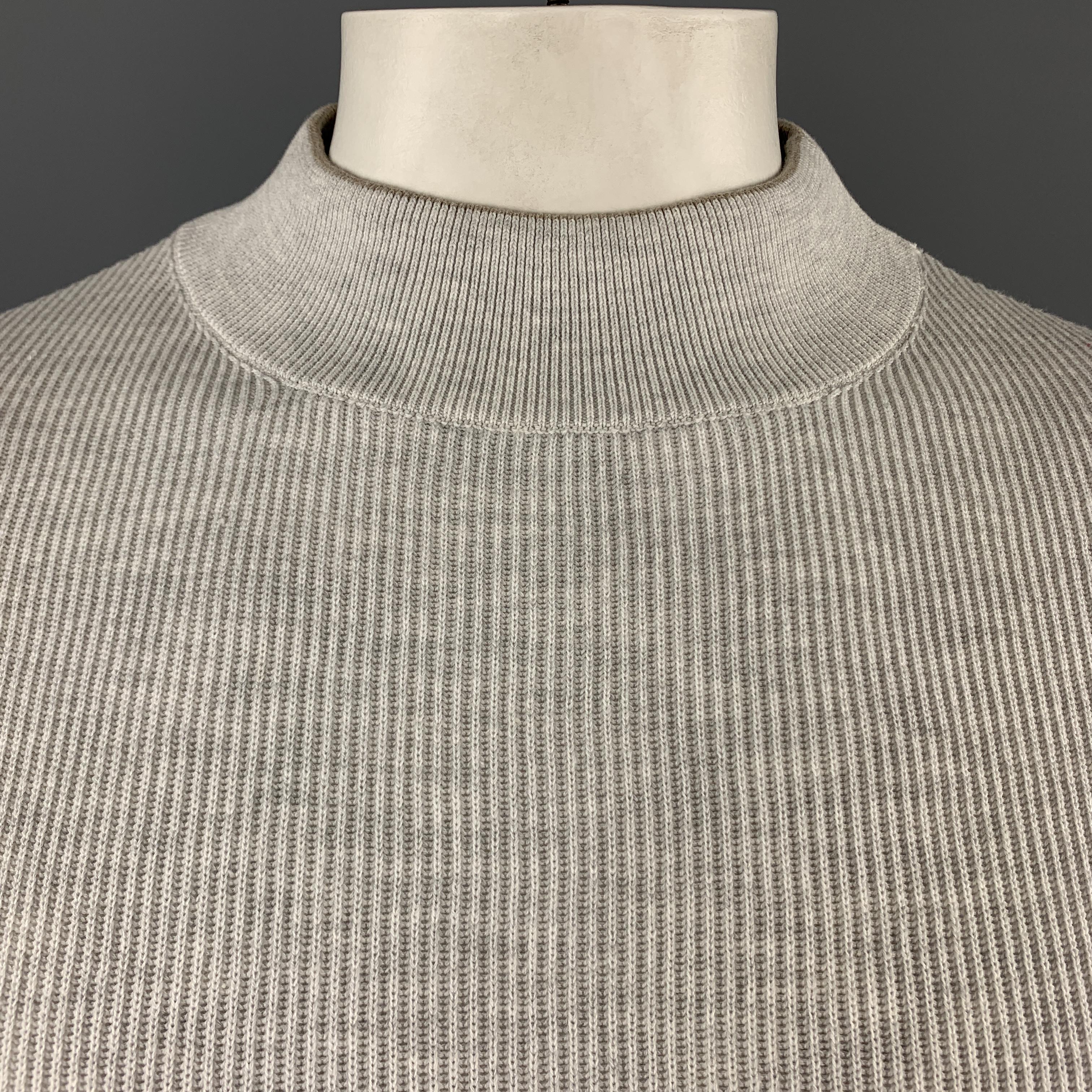 BRUNELLO CUCINELLI pullover comes in light heather gray cotton ribbed knit with a high mock neck collar trimmed with a taupe stripe. Made in Italy.

New with Tags. 
Marked: IT 54

Measurements:

Shoulder: 18 in.
Chest: 46 in.
Sleeve: 31 in.
Length: