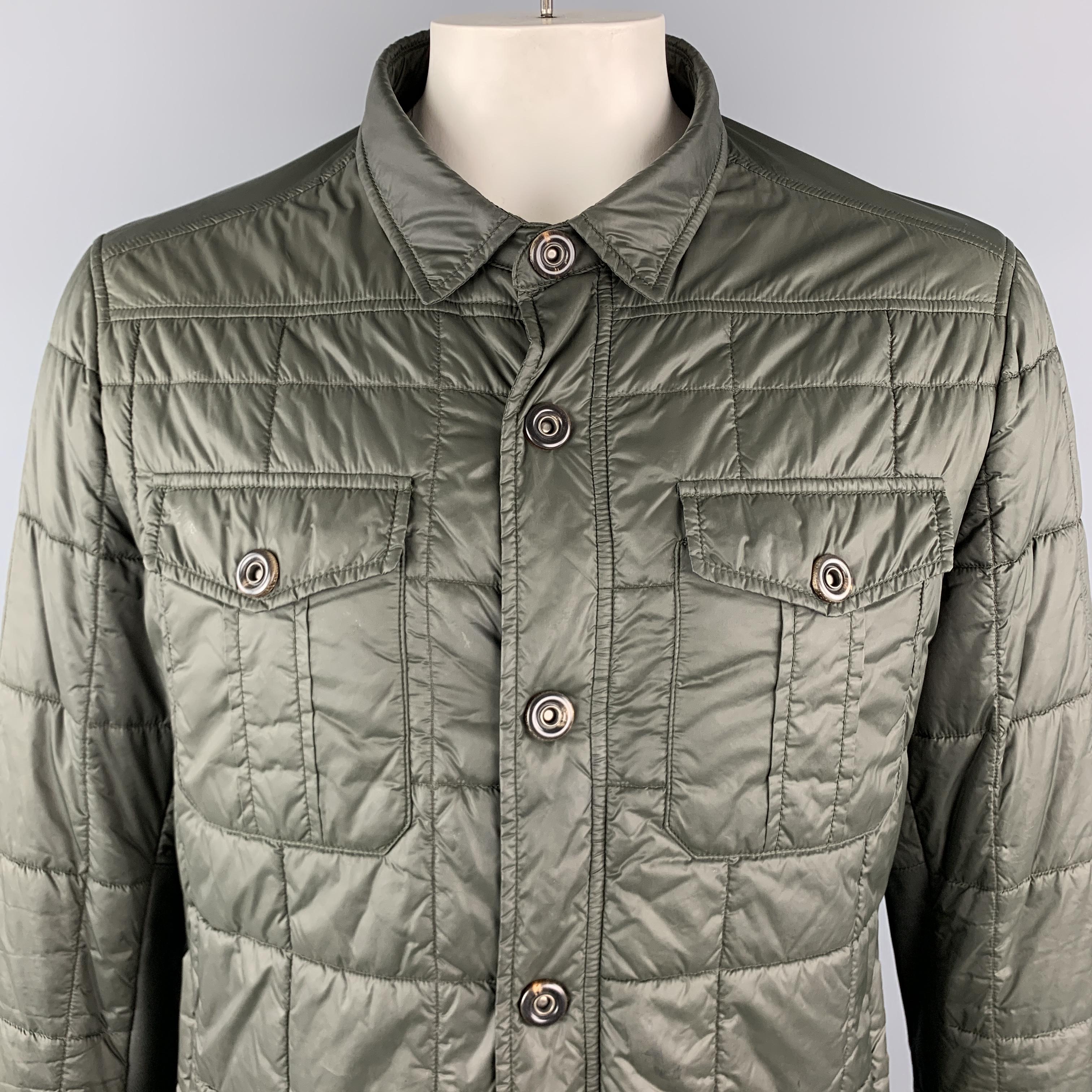 BRUNELLO CUCINELLI  Jacket comes in an olive quilted nylon material, with snaps at closure, cuffs and pockets, zip pockets, leather trim, and elbow patches. Made in Italy.

Excellent Pre-Owned Condition.
Marked: XL

Measurements:

Shoulder: 17 in.