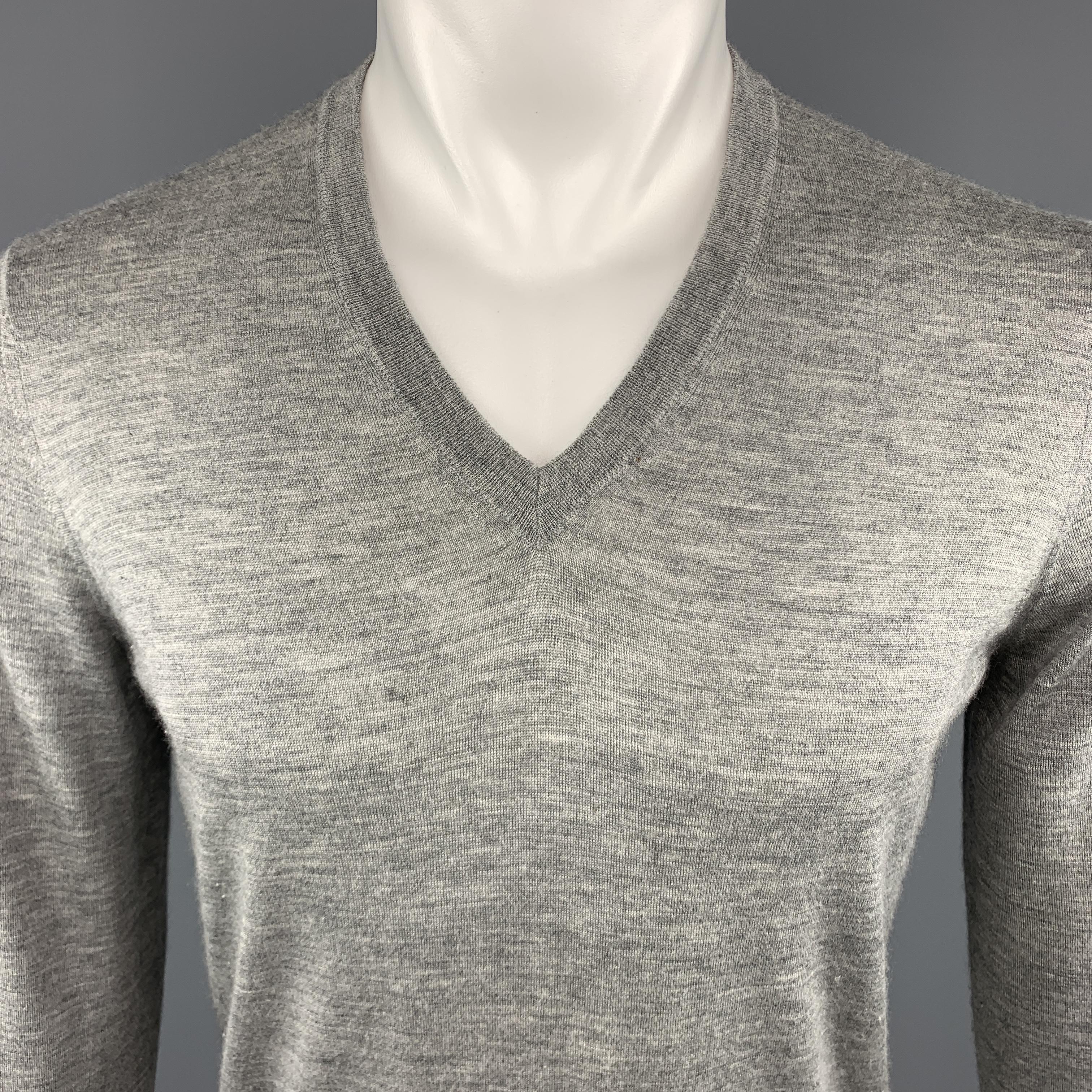 BRUNELLO CUCINELLI Pullover Sweater comes in a gray tone in a heather cashmere / silk material, with a V-neck, long sleeves and ribbed cuffs and hem. Made in Italy.
 
Excellent Pre-Owned Condition.
Marked: IT 46
 
Measurements:
 
Shoulder: 16.5