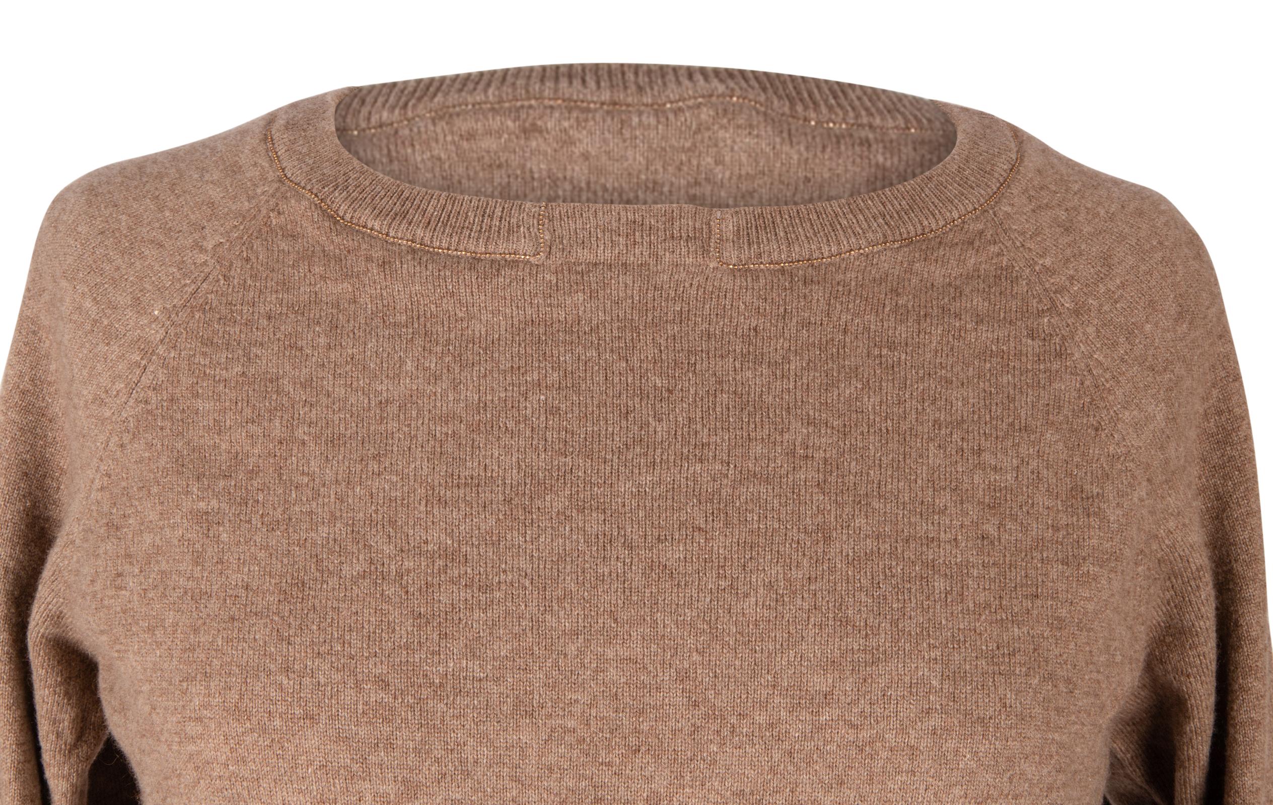 Mightychic offers a Brunello Cucinelli straight cut pull on sweater.  
Fabulous, soft and chic pullover sweater with drawstring hem.
7 1/4